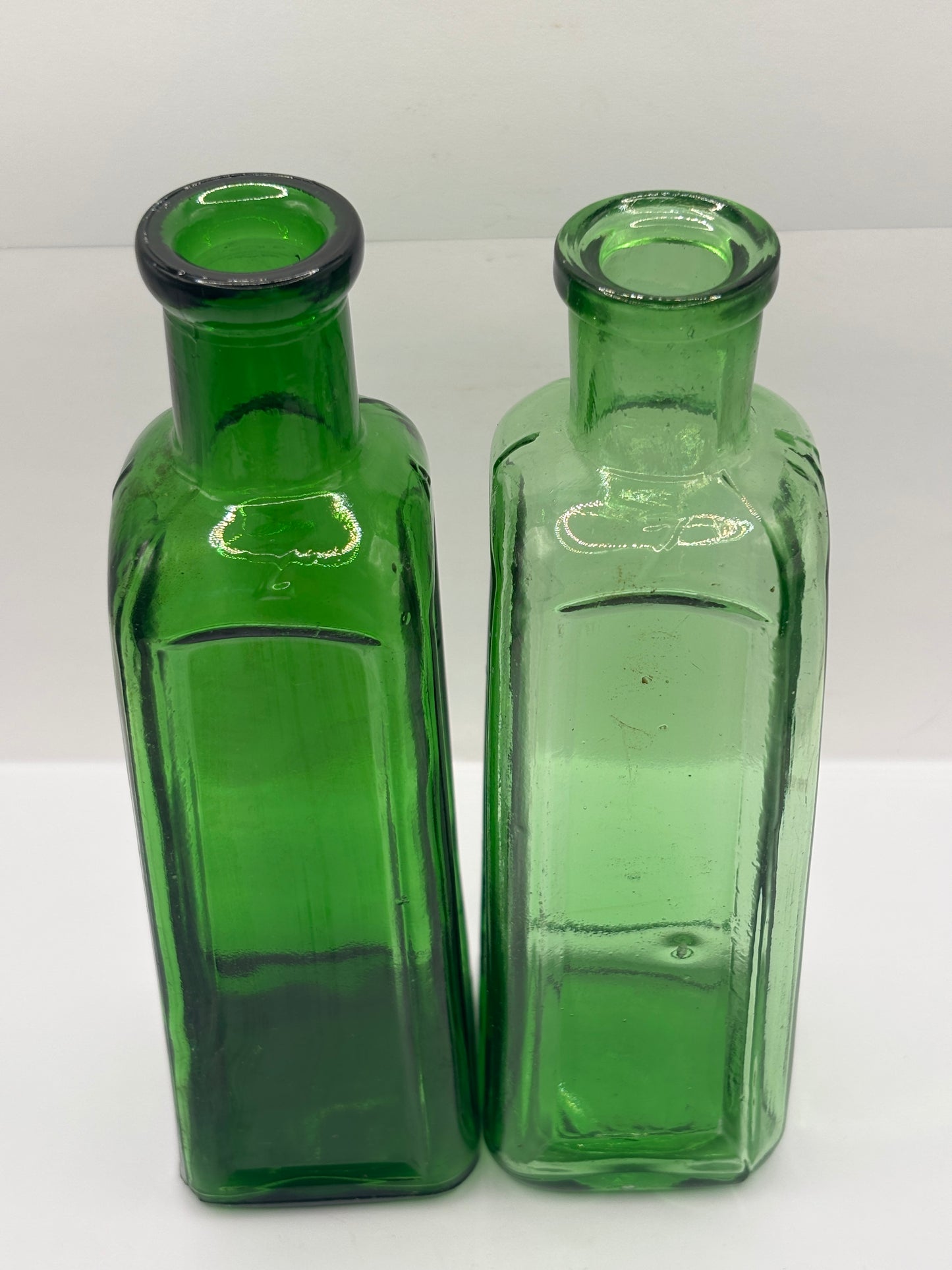 2 old green glass IZAL bottles