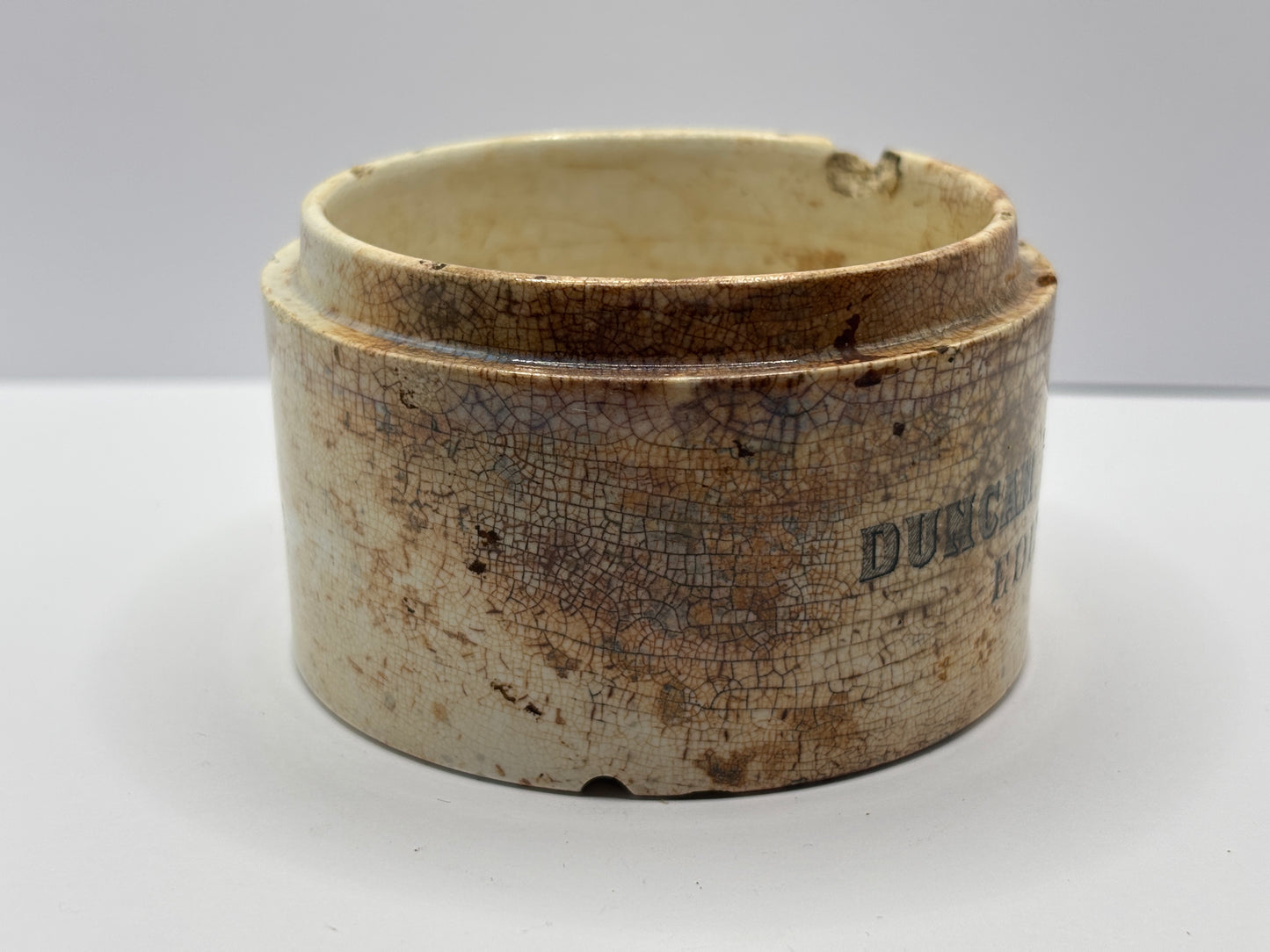 Old large Duncan Flockhart advertising chemist base, stained & crazed