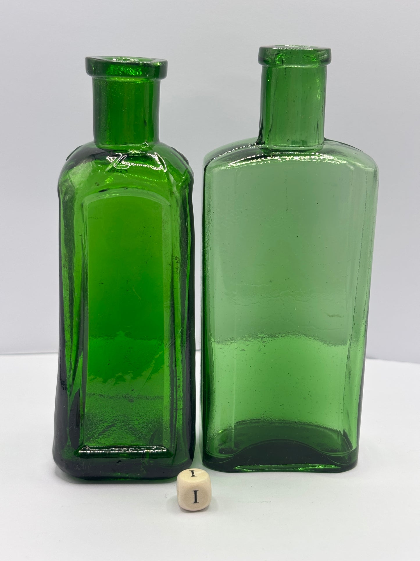 2 old green glass bottles (i)