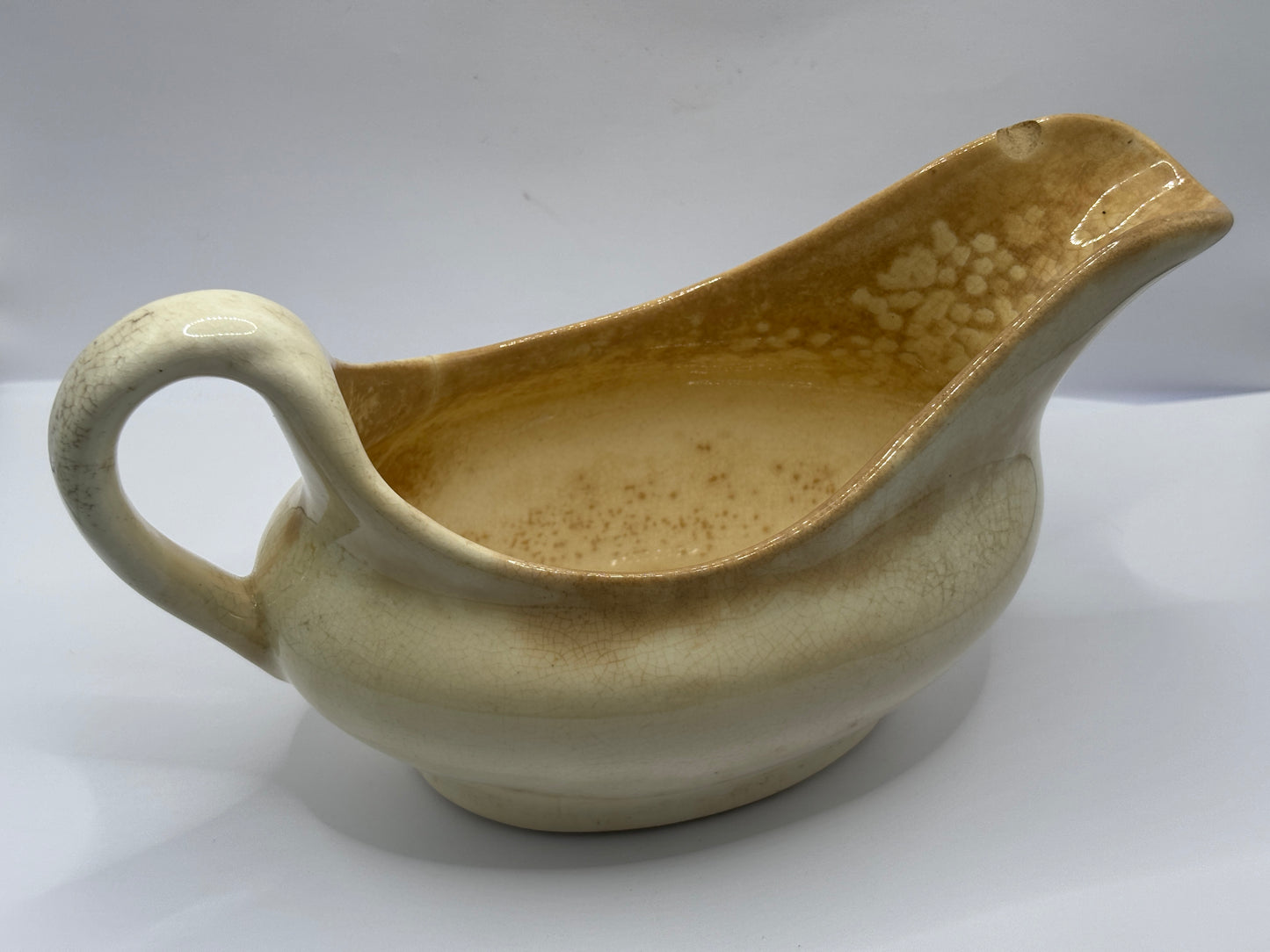 Old stained & crazed handled jug, gravy boat