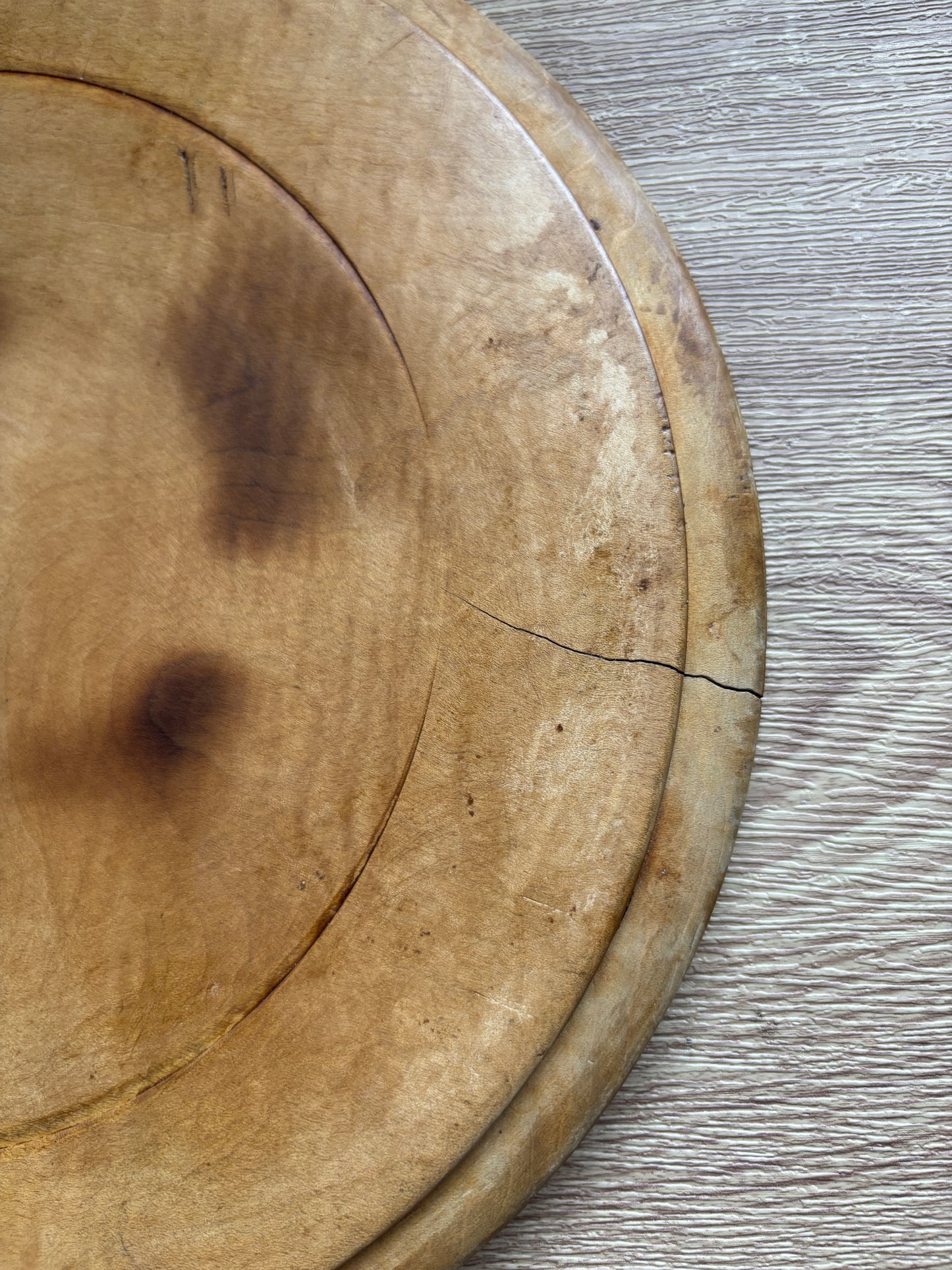 Old wooden carved bread board