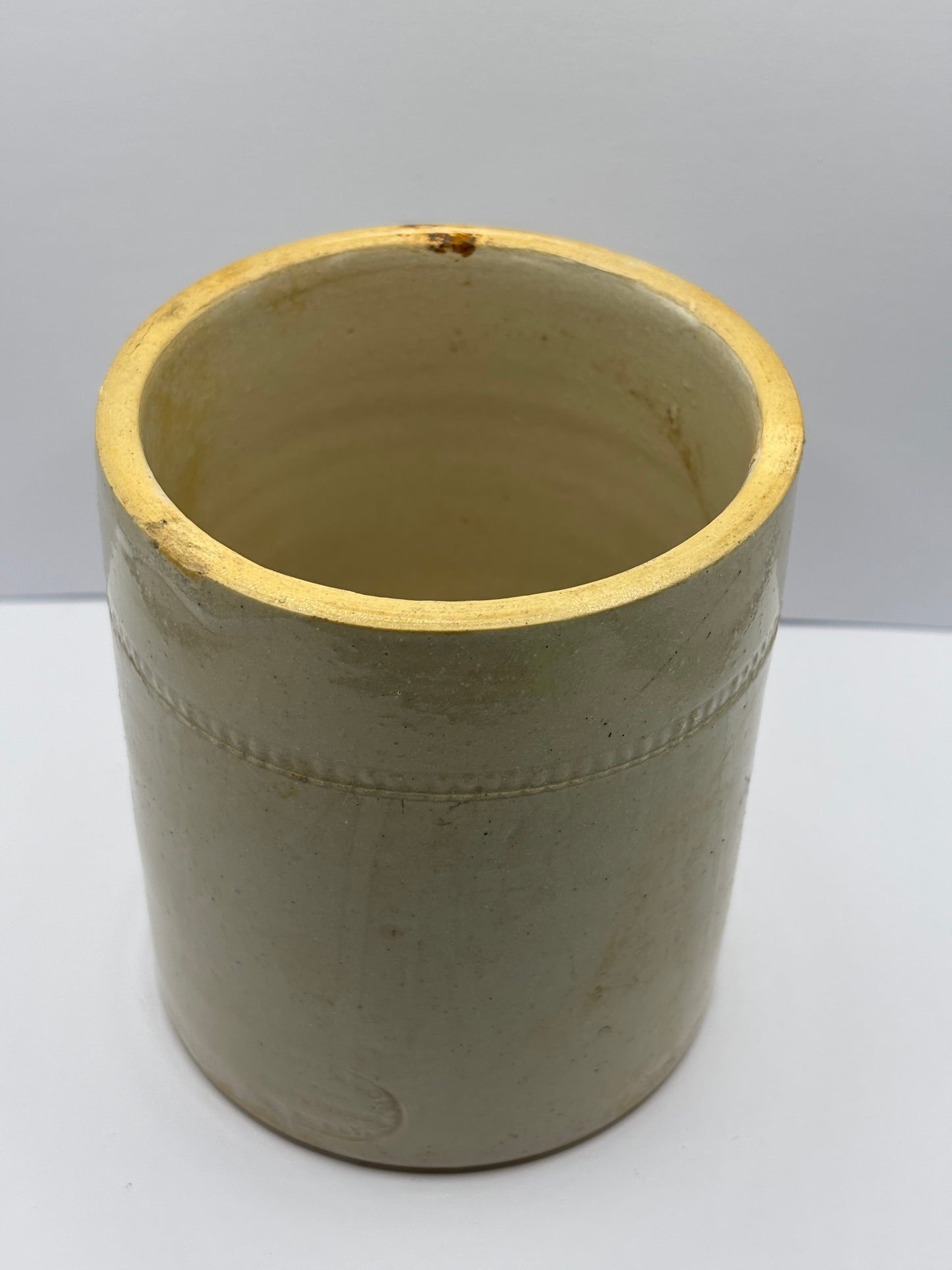 Old white stoneware jar