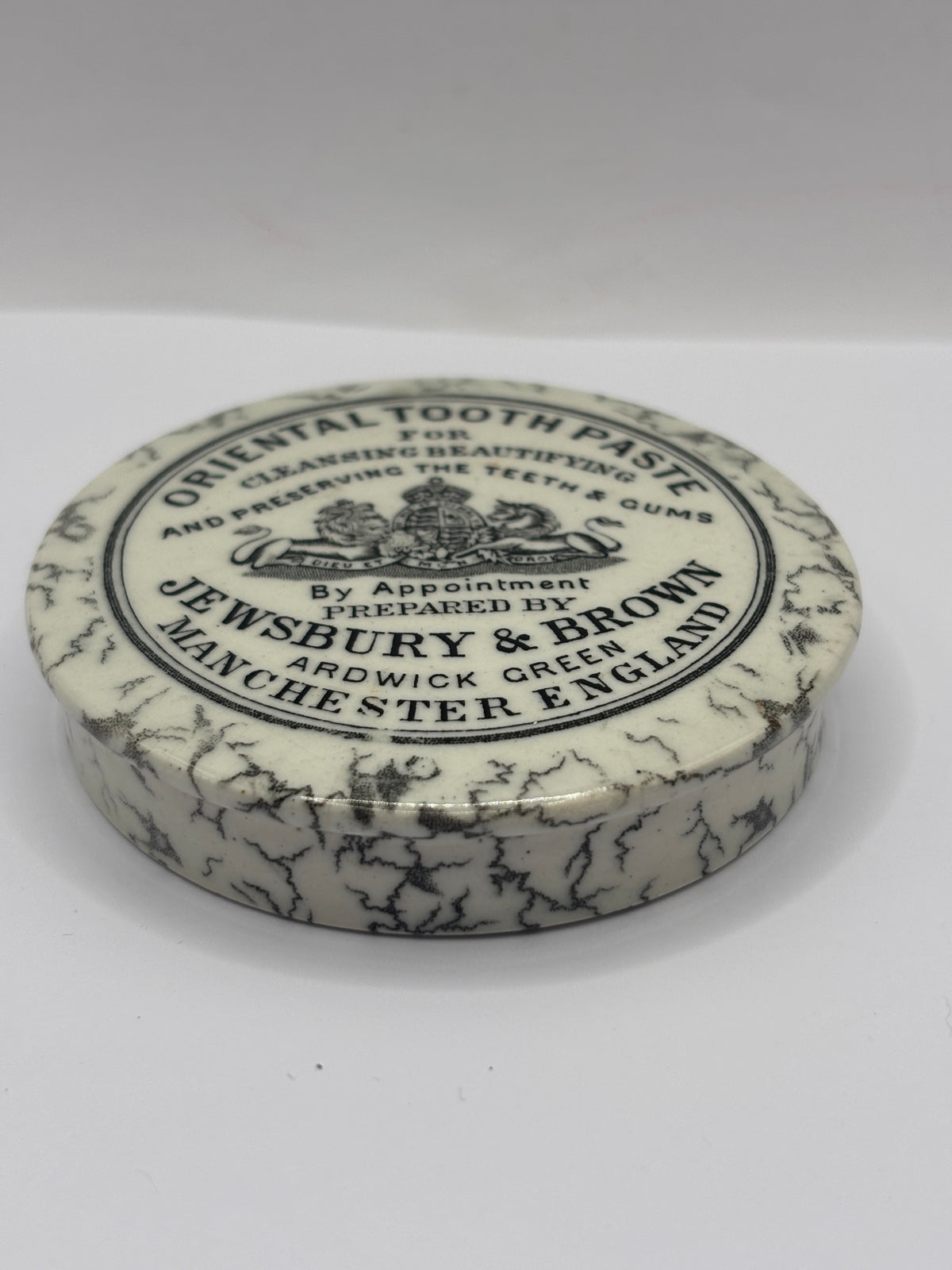 Old advertising lid. Oriental tooth paste Jewsbury & Brown