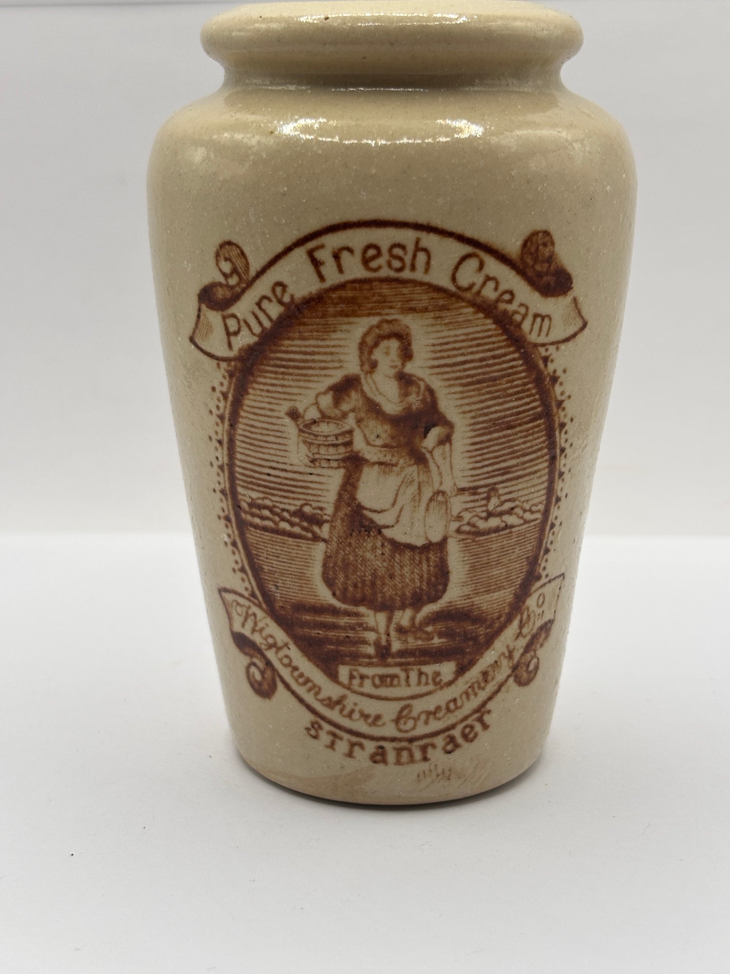 Old stoneware advertising cream pot, pure fresh cream Stranraer. Serpia print