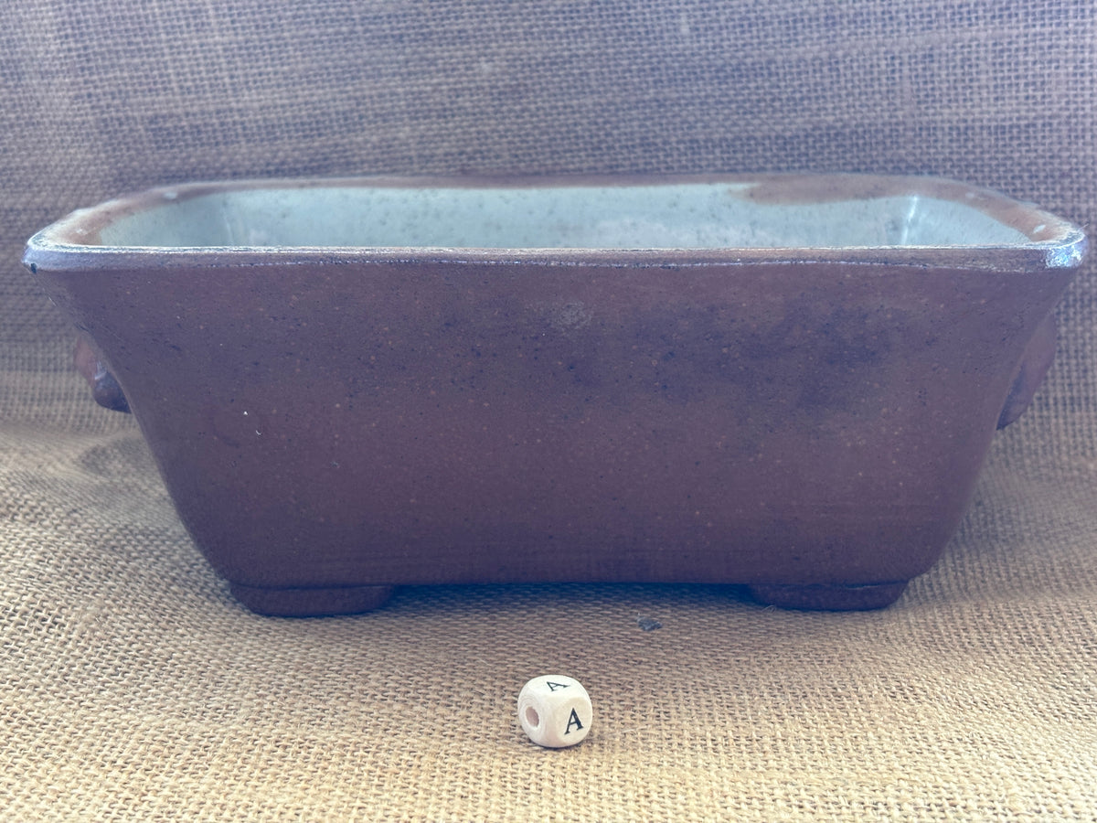 Old brown salt glaze stoneware pie dish (a)