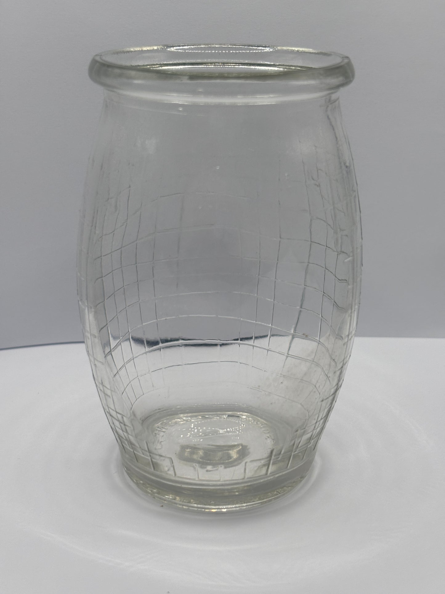 Old clear glass meat paste jar