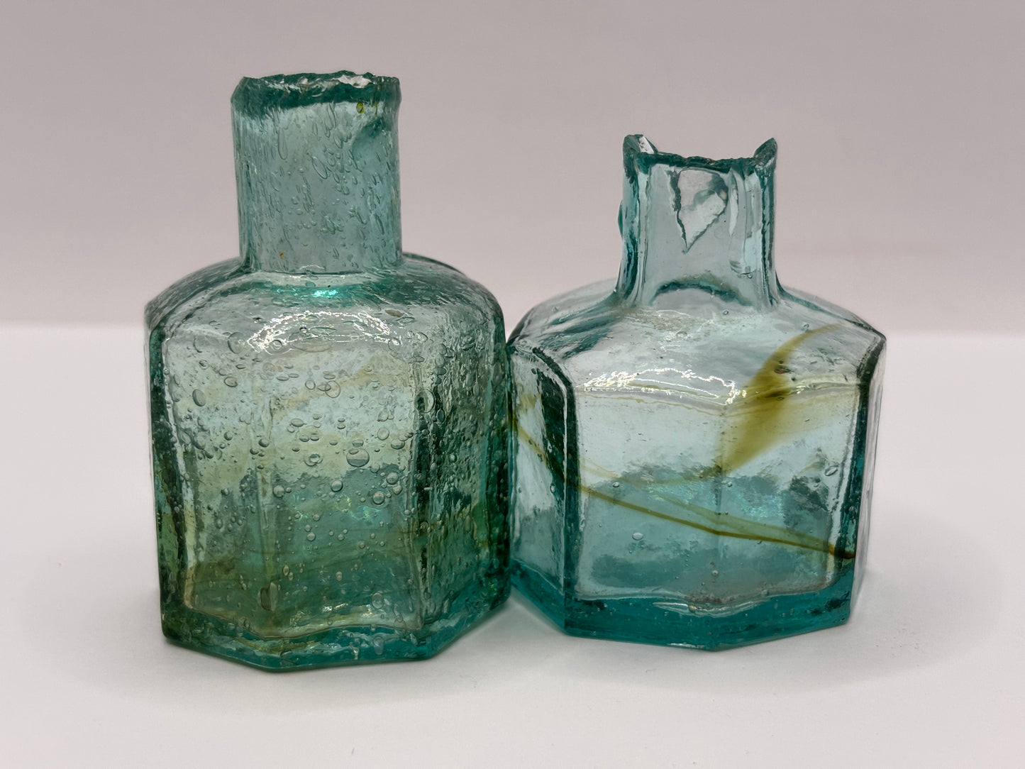 2 old swirly glass ink bottles, inkwells, penny ink