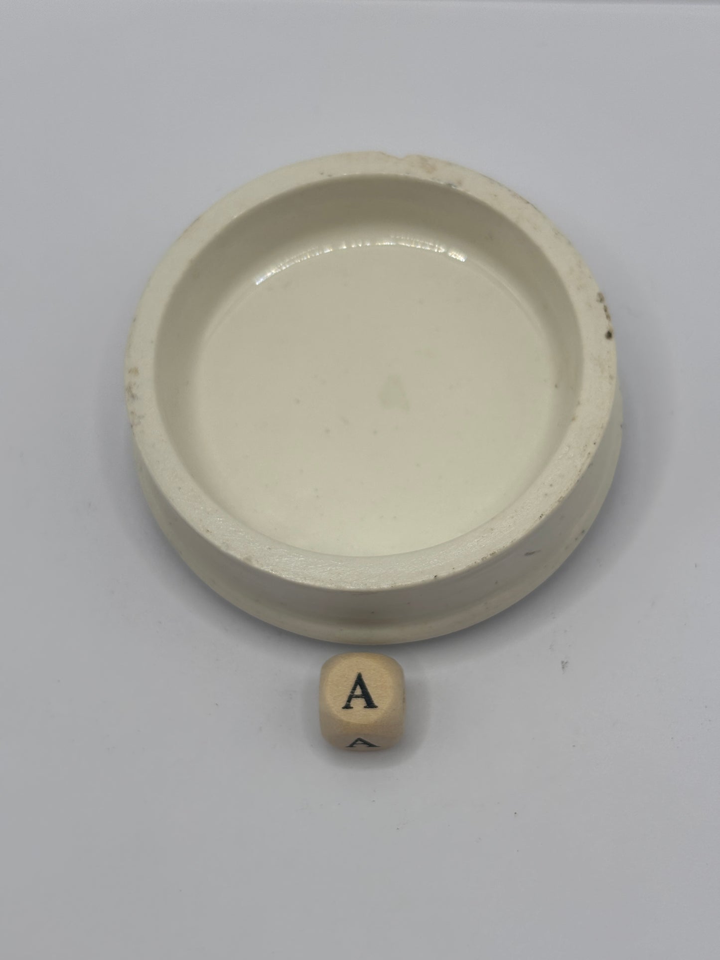 Old advertising lid, Woods areca nut tooth paste (a)