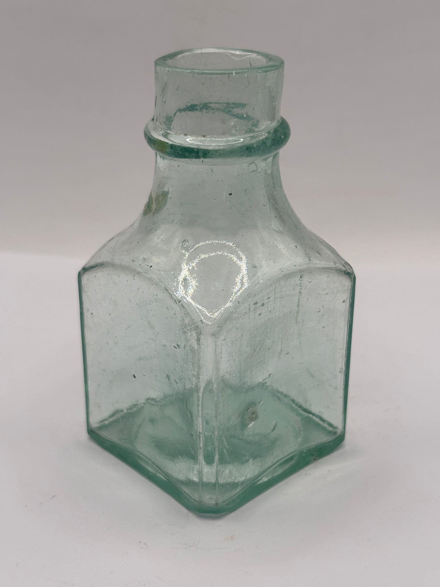 Old tall aqua inkwell,ink bottle. 9cms