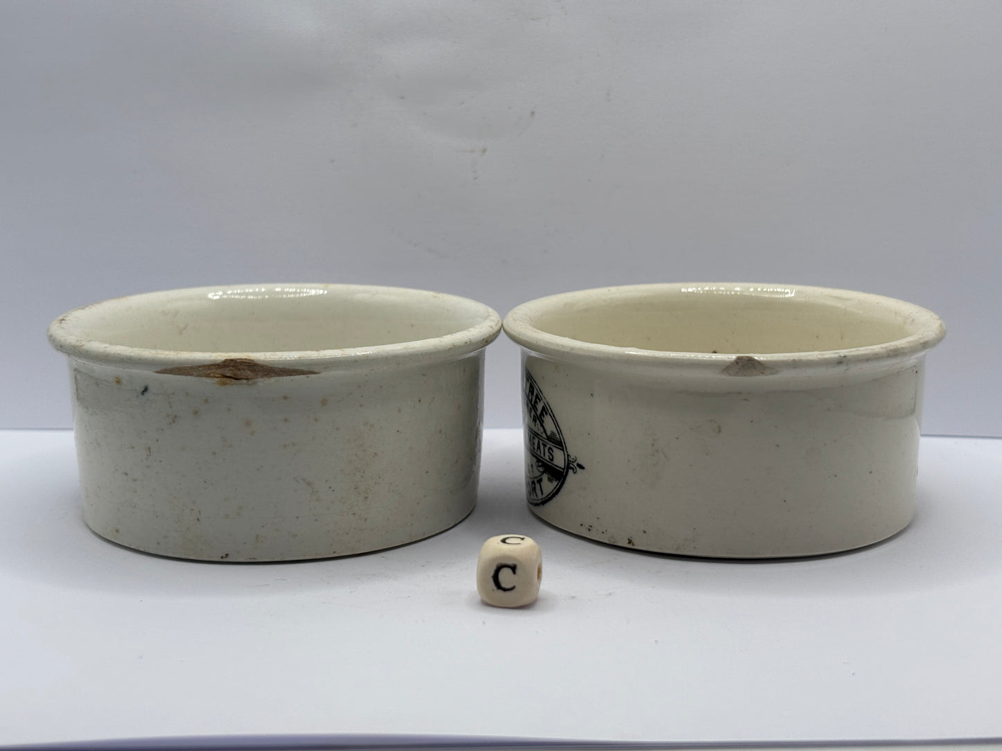 2 old advertising meat paste pots (c) chipped