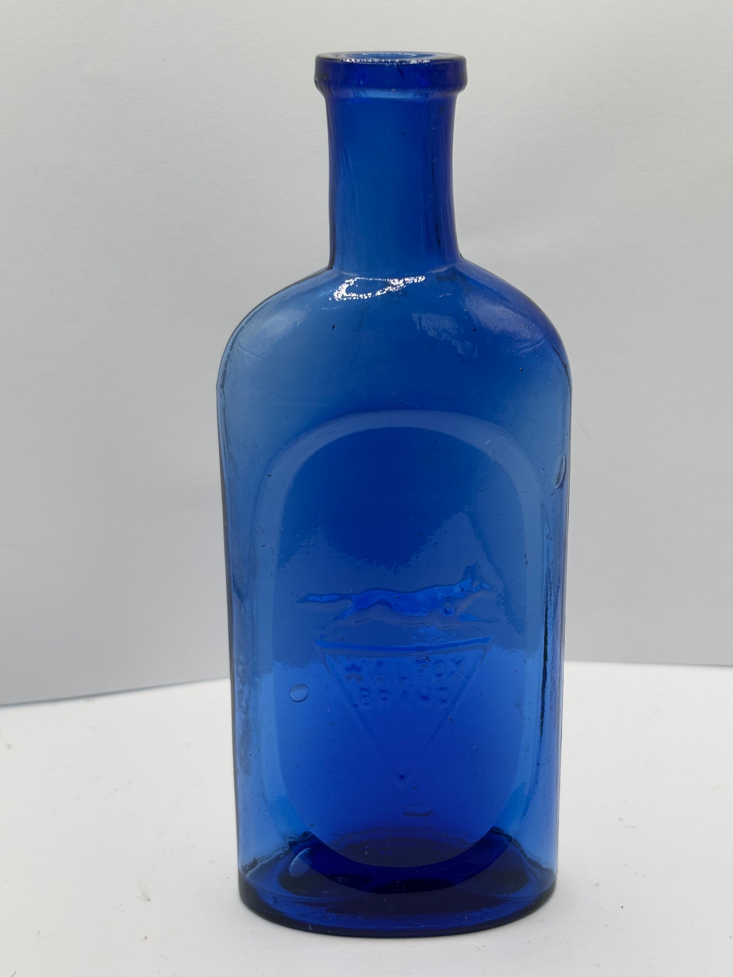 Old blue Walfox brand bottle