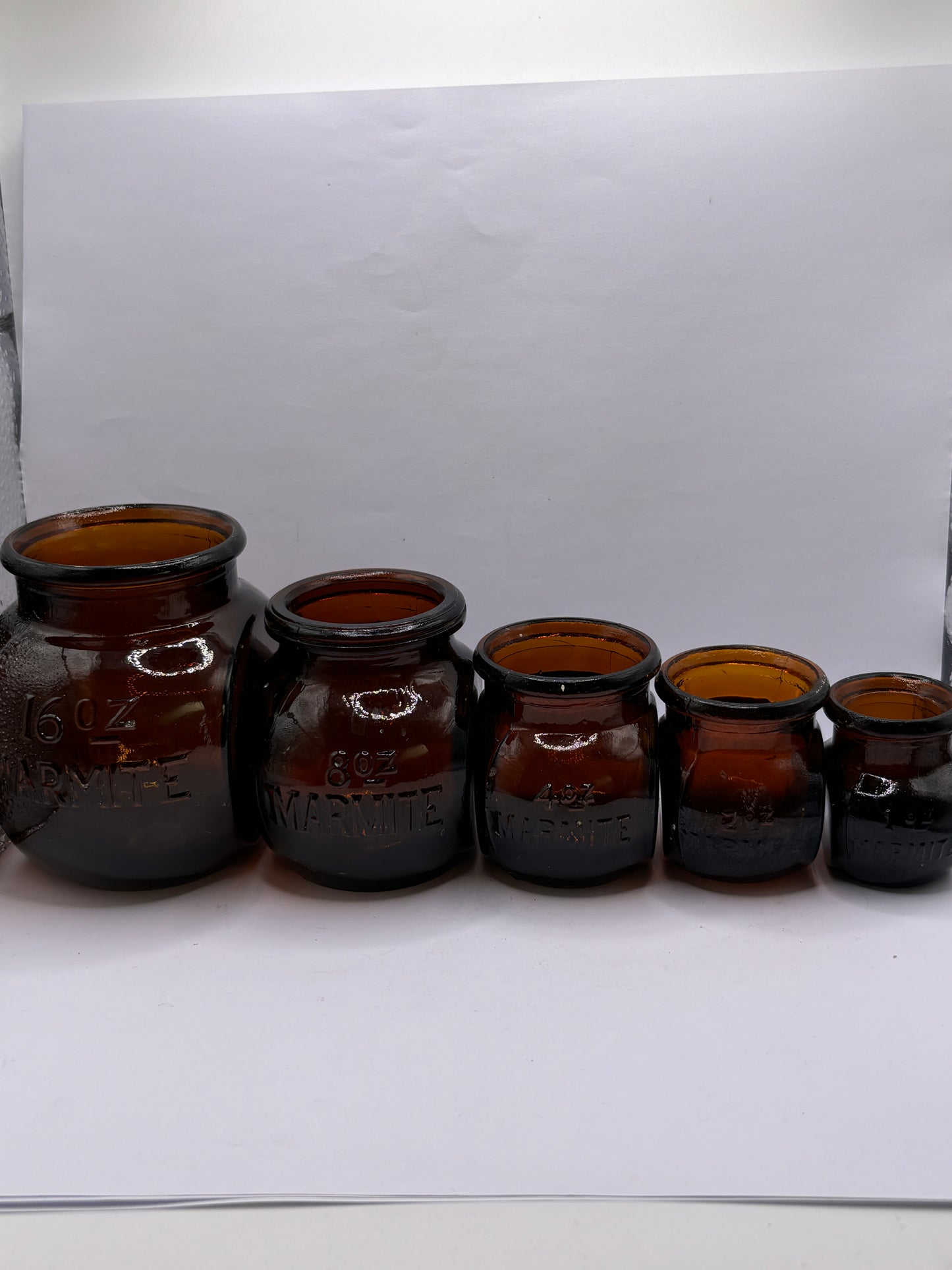 5 old amber glass marmite jars (B)