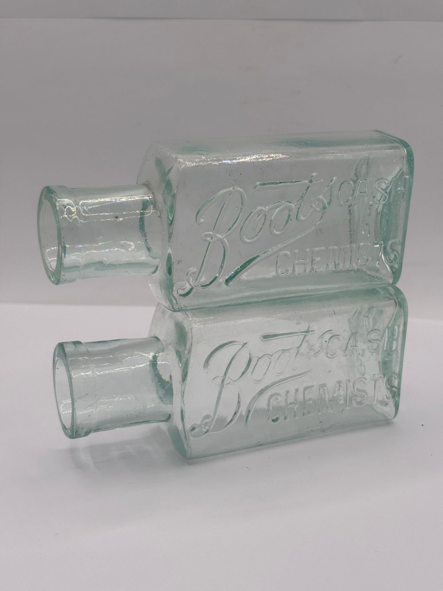 2 Old glass Boots cash chemists bottles