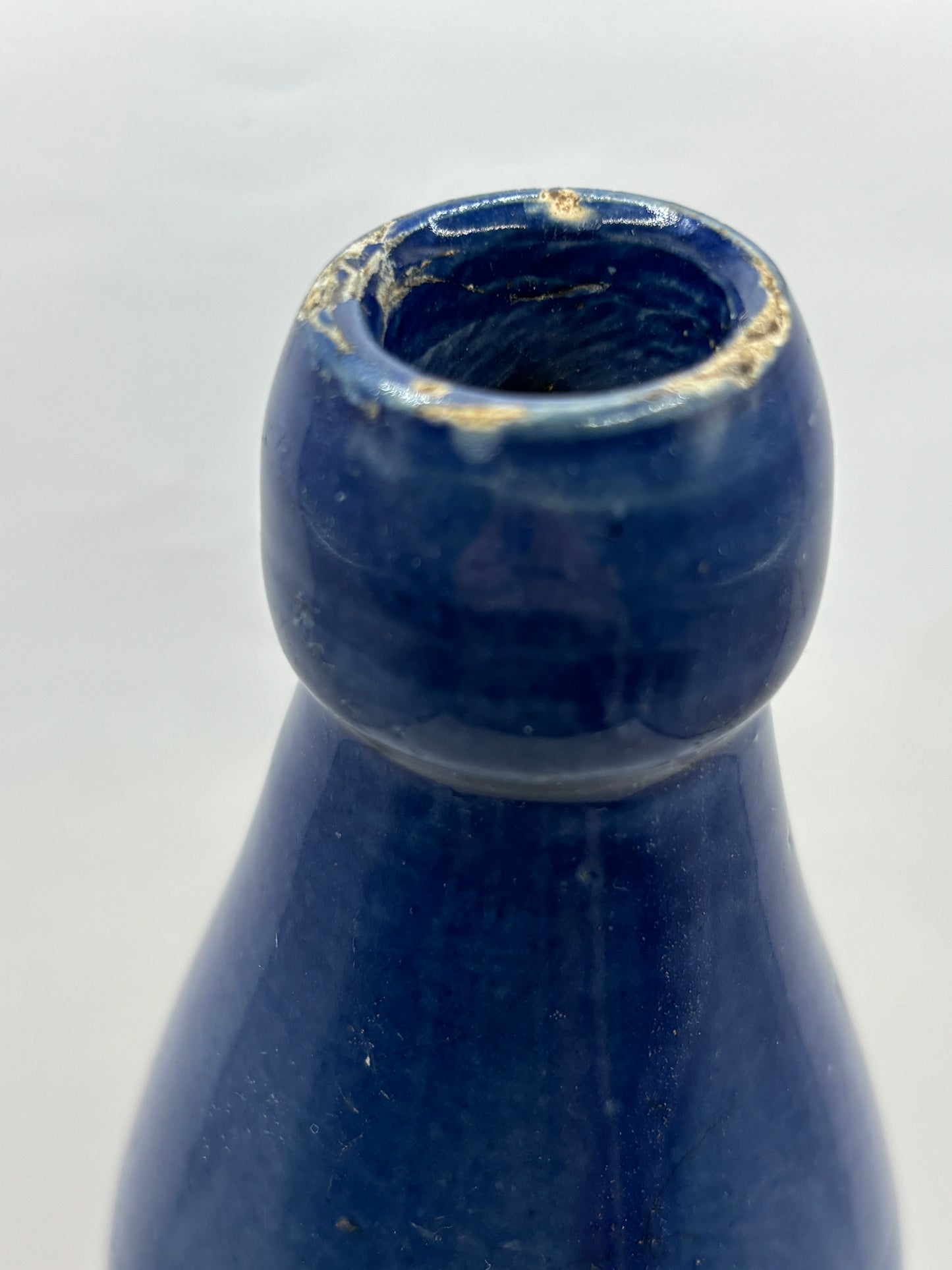 Old blue top ginger beer bottle