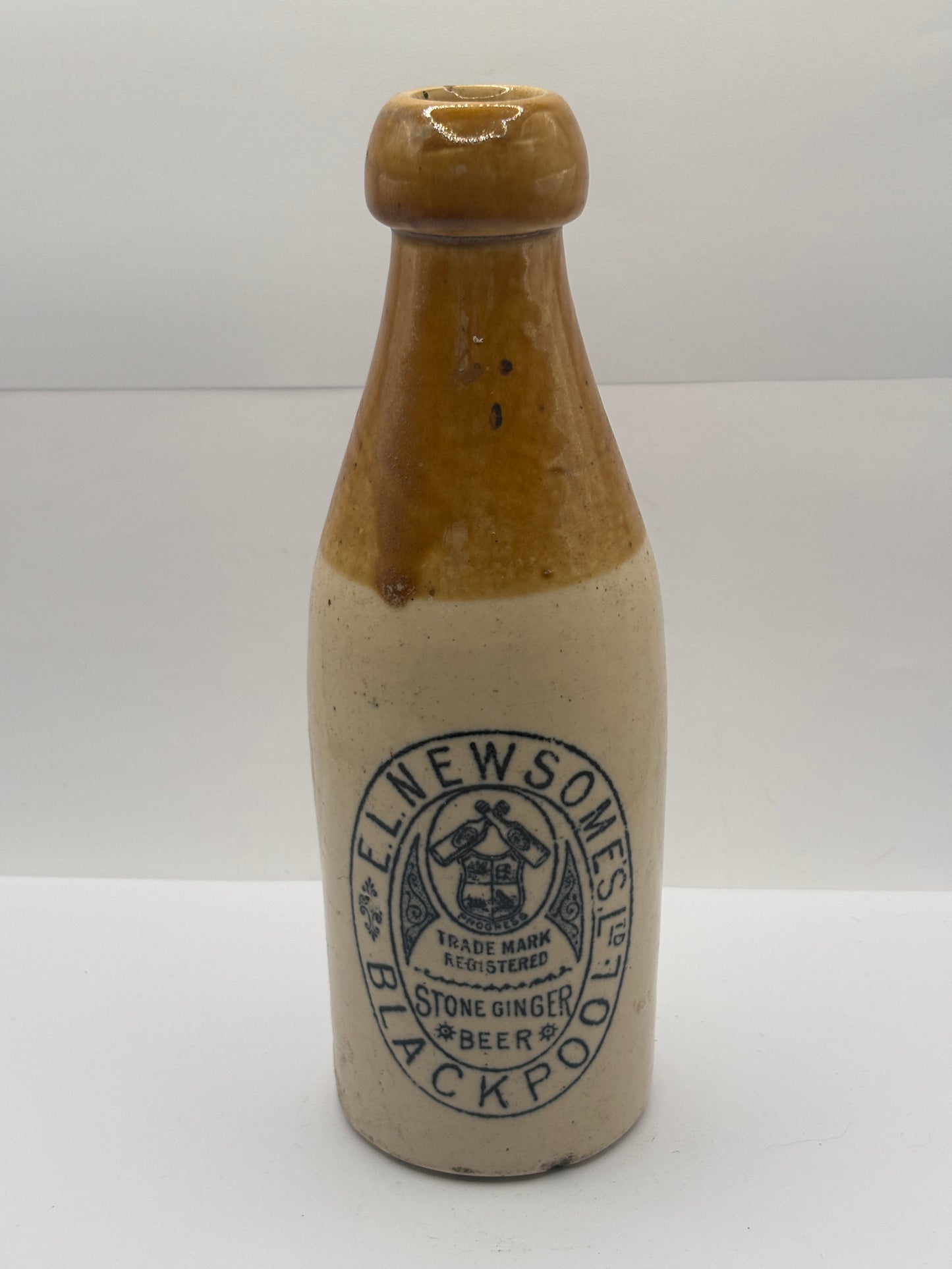 Old stoneware ginger beer bottle, EL Newsomes Blackpool