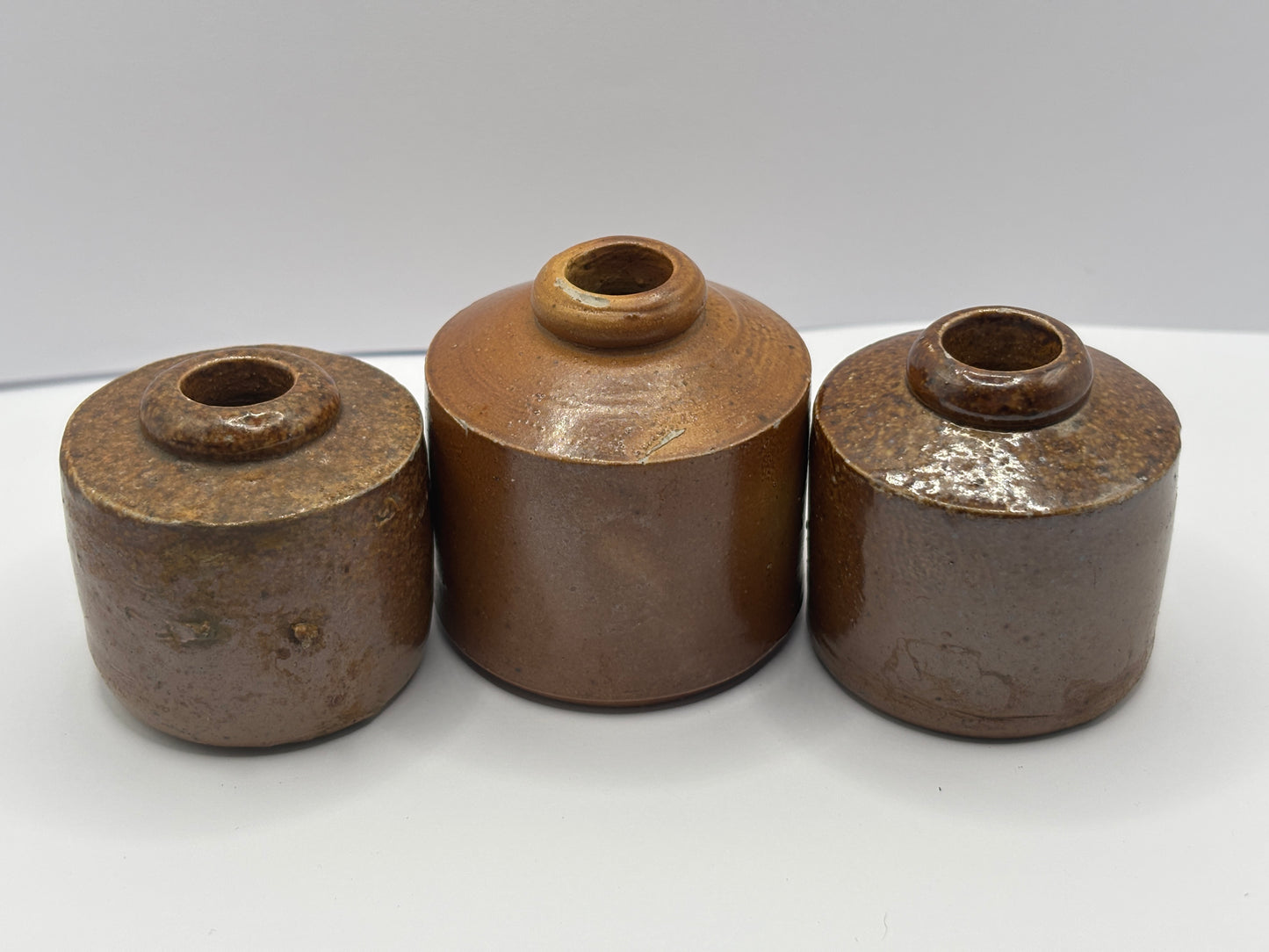 3 old stoneware pork pie inks, inkwells