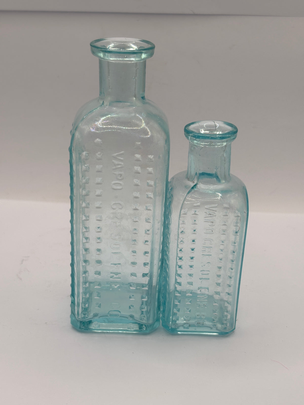 2 aqua glass bottles, Vapo-cresolene co