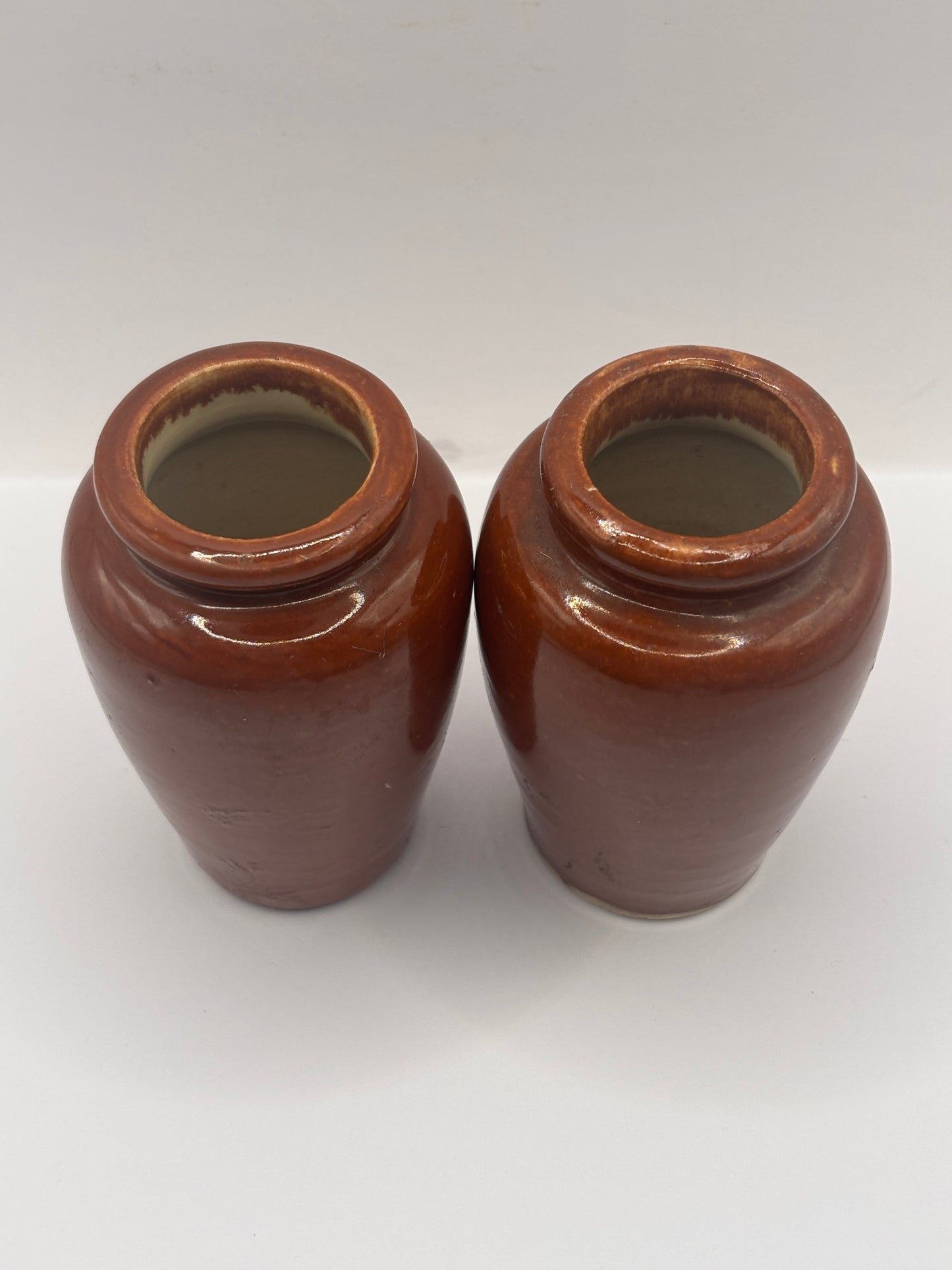 2 Old plain brown stoneware cream pots