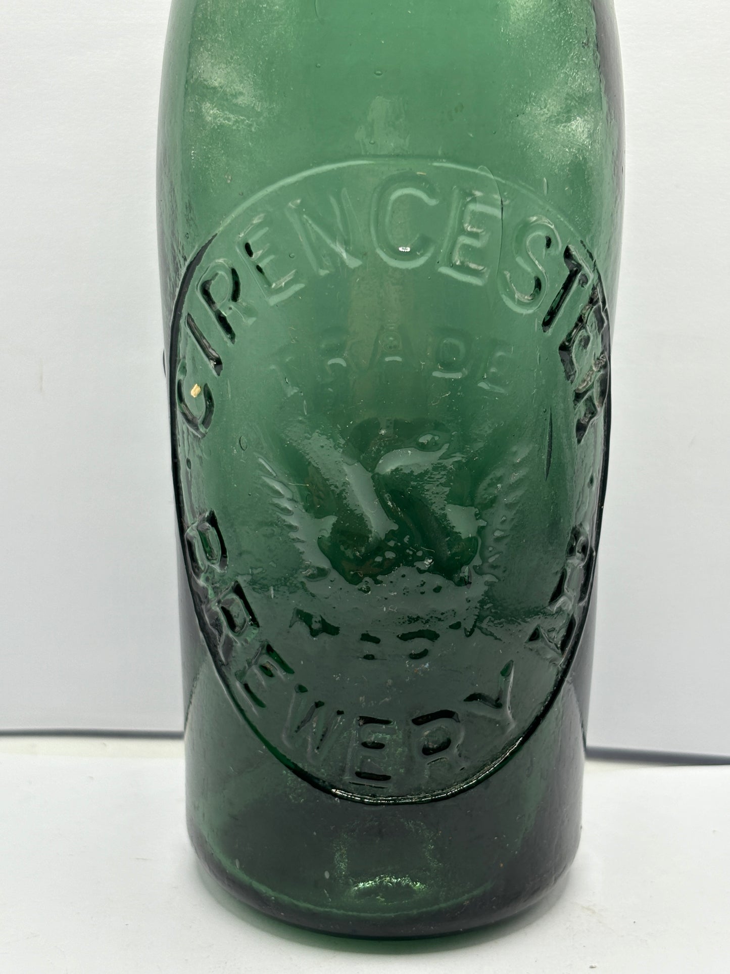 Old green glass beer bottle, Cirencester brewery