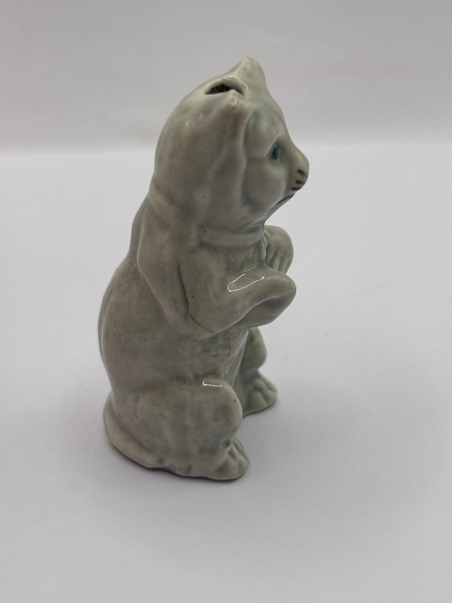 Old stoneware cat decoration