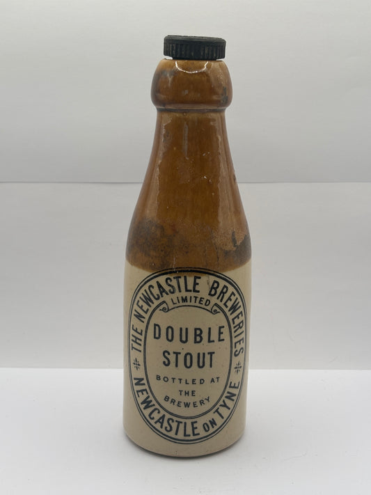 Old stoneware stout bottle, The newcastle breweries double stout. Newcastle on tyne