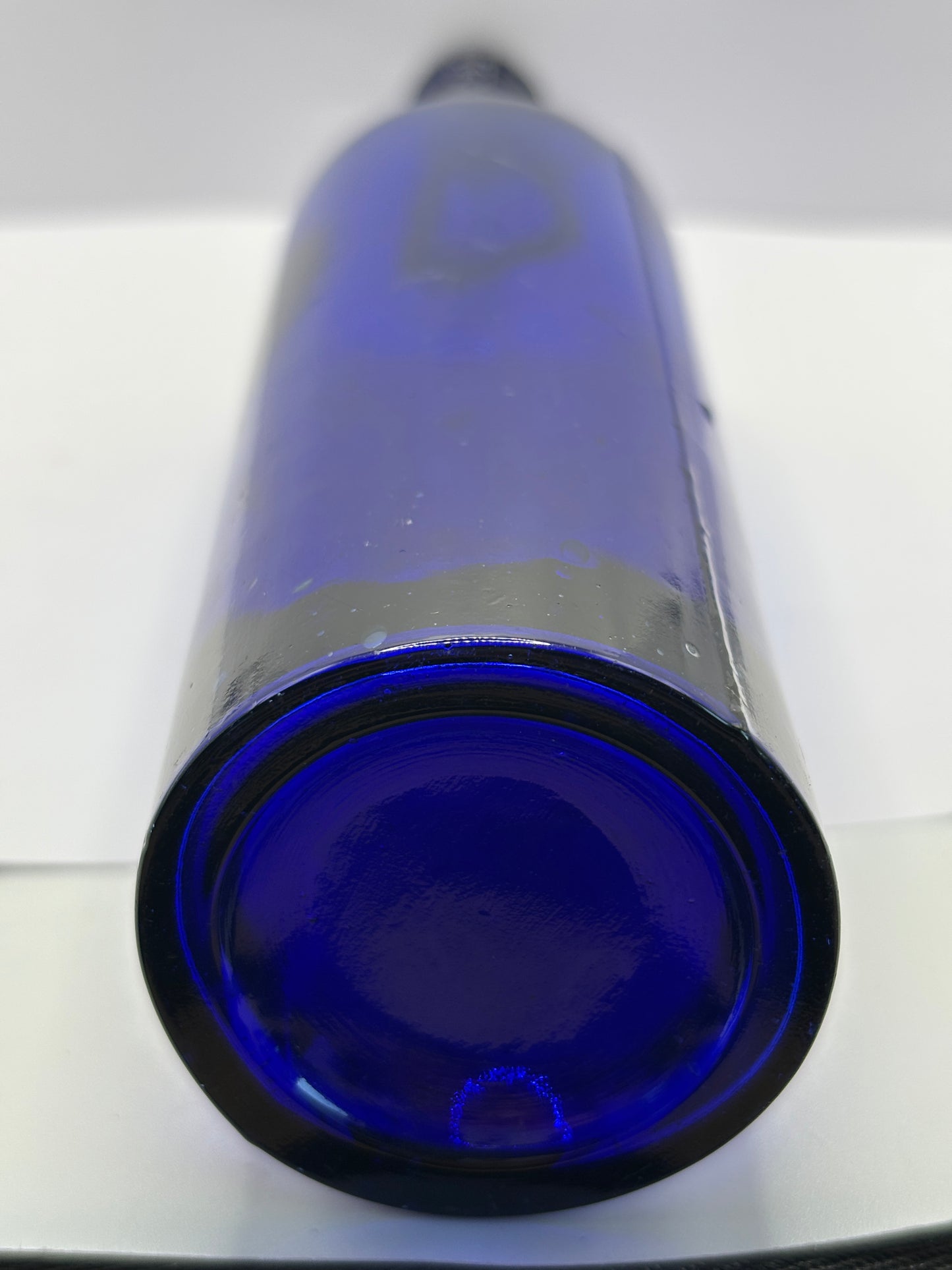 Tall blue castor oil bottle 24cms