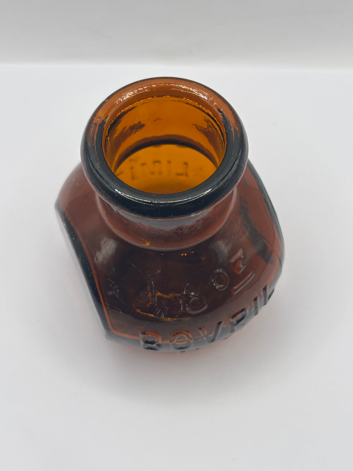 Old 8oz amber glass advertising Bovril bottle