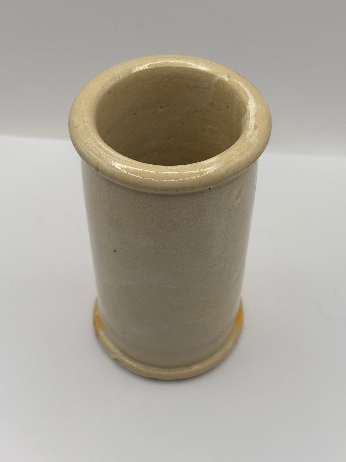 Old tall stained stoneware cream pot