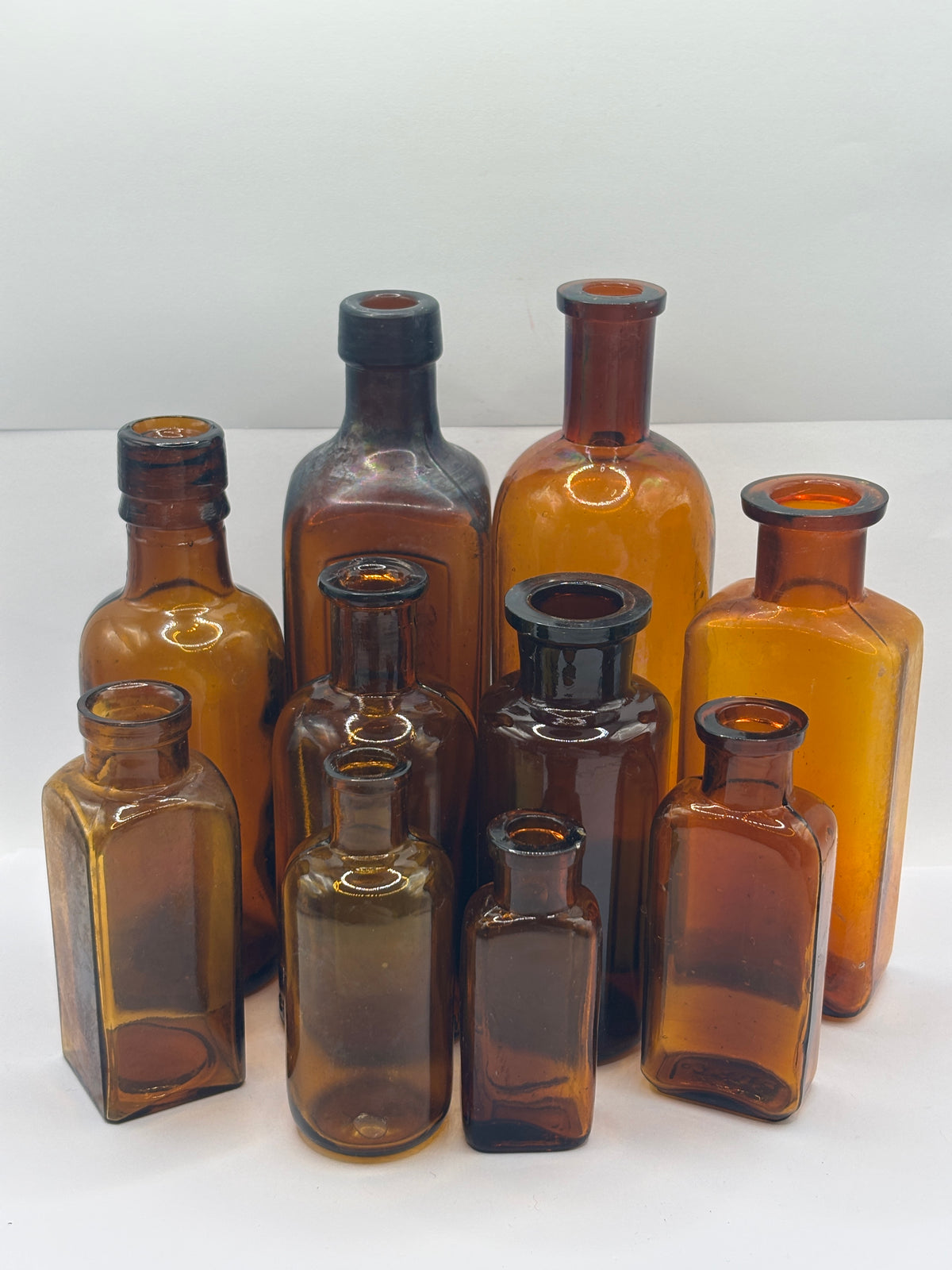 10 Old amber glass chemist bottles