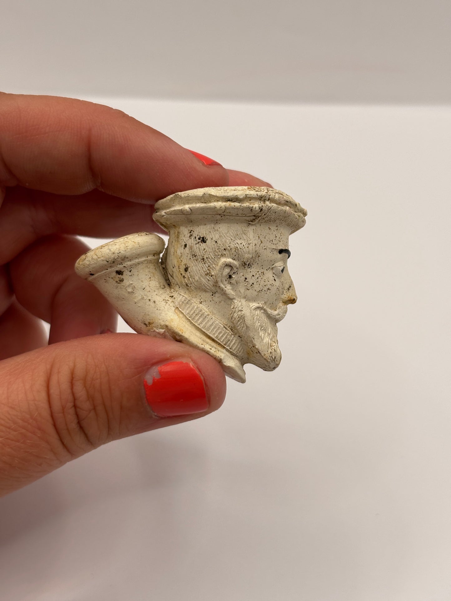 Old figural clay pipe head, pipe bowl