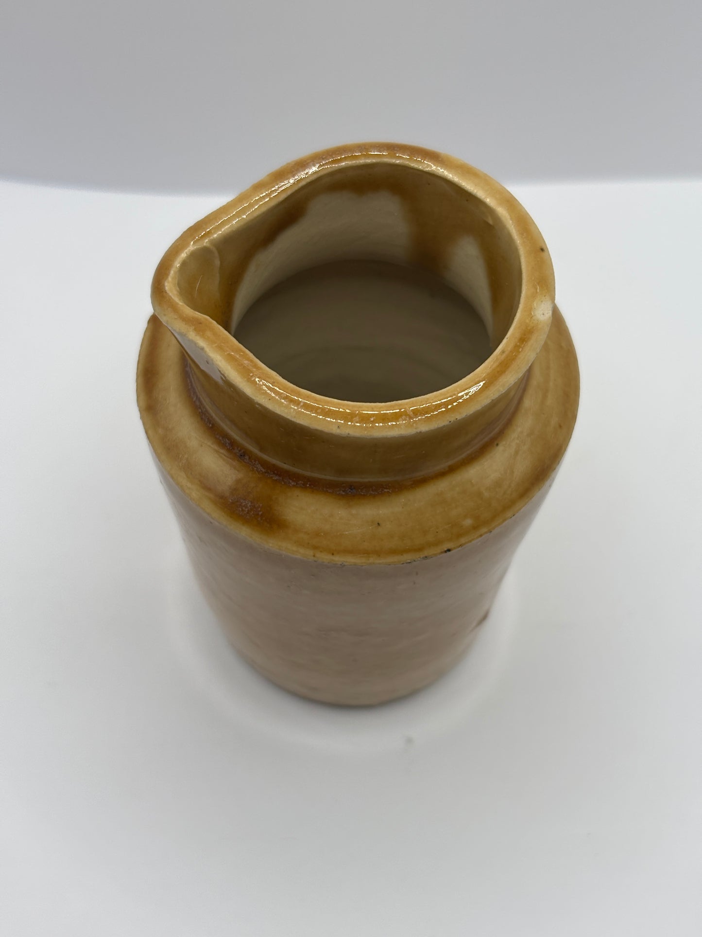 old brown stoneware cream pot