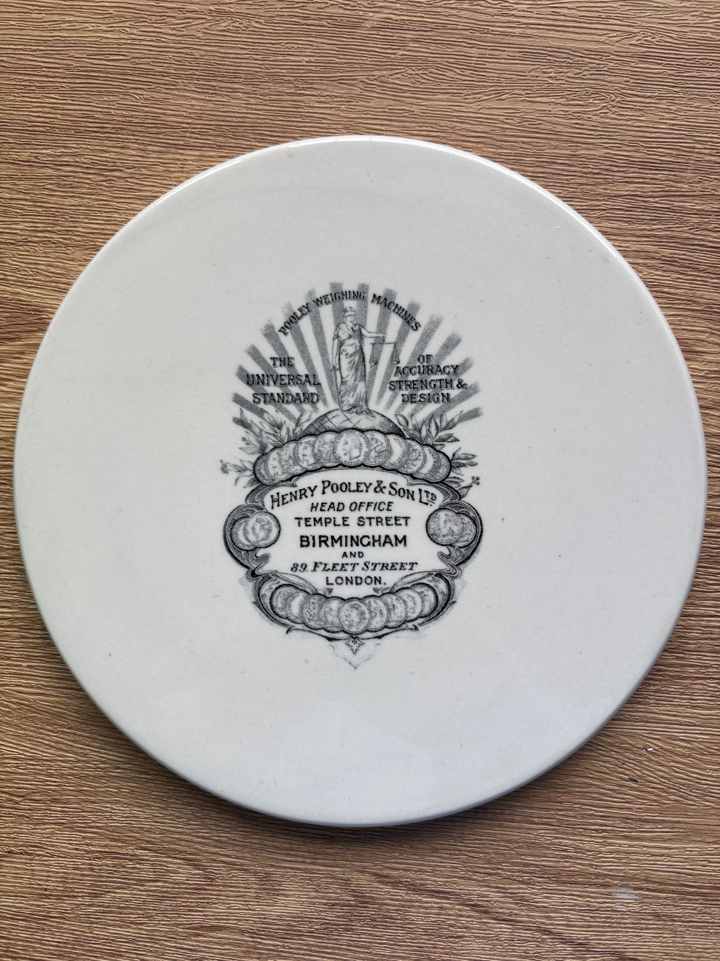 Old ironstone advertising scale plate 20cms, Henry Pooley & son. Birmingham & london