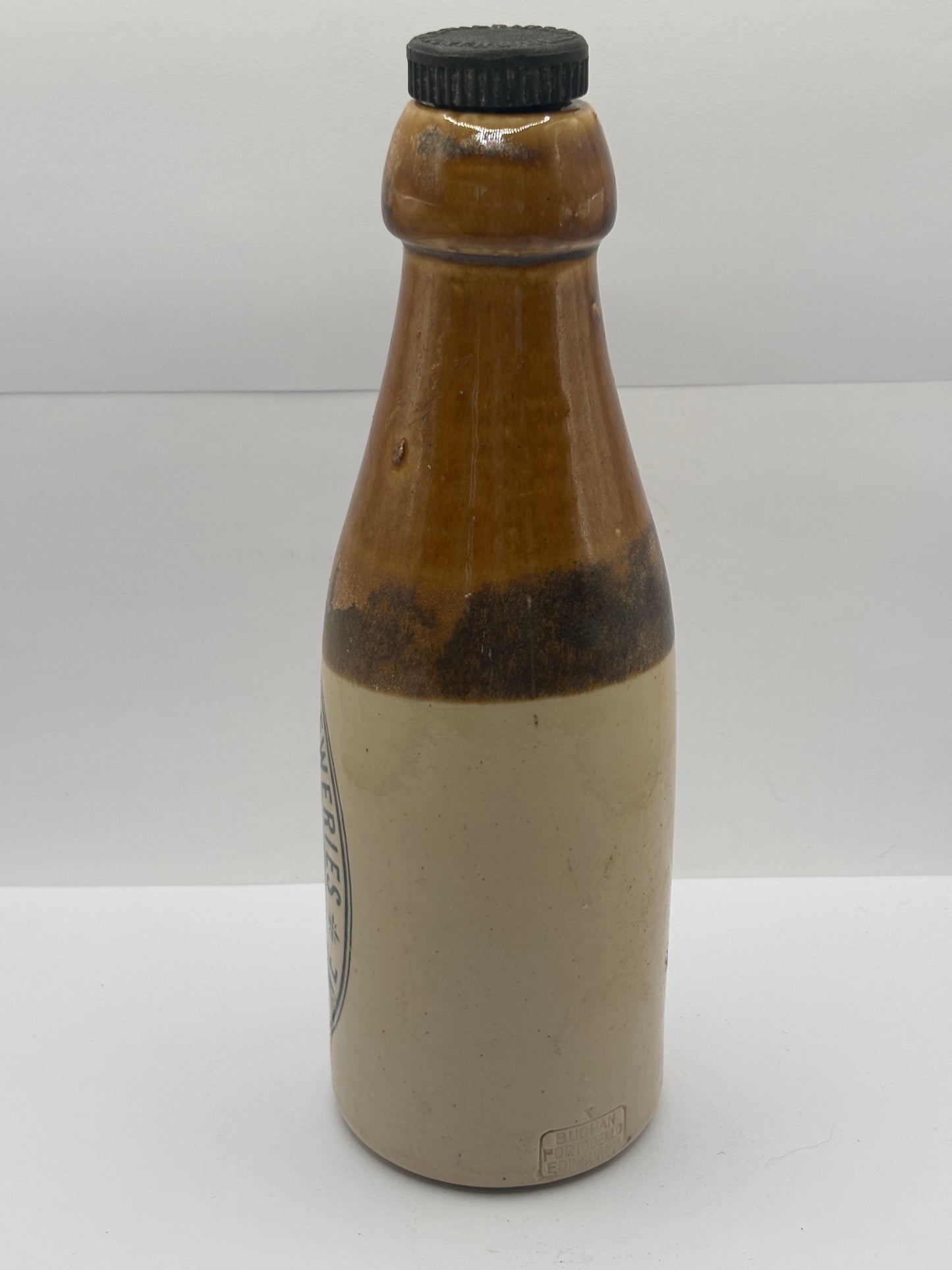 Old stoneware stout bottle, The newcastle breweries double stout. Newcastle on tyne