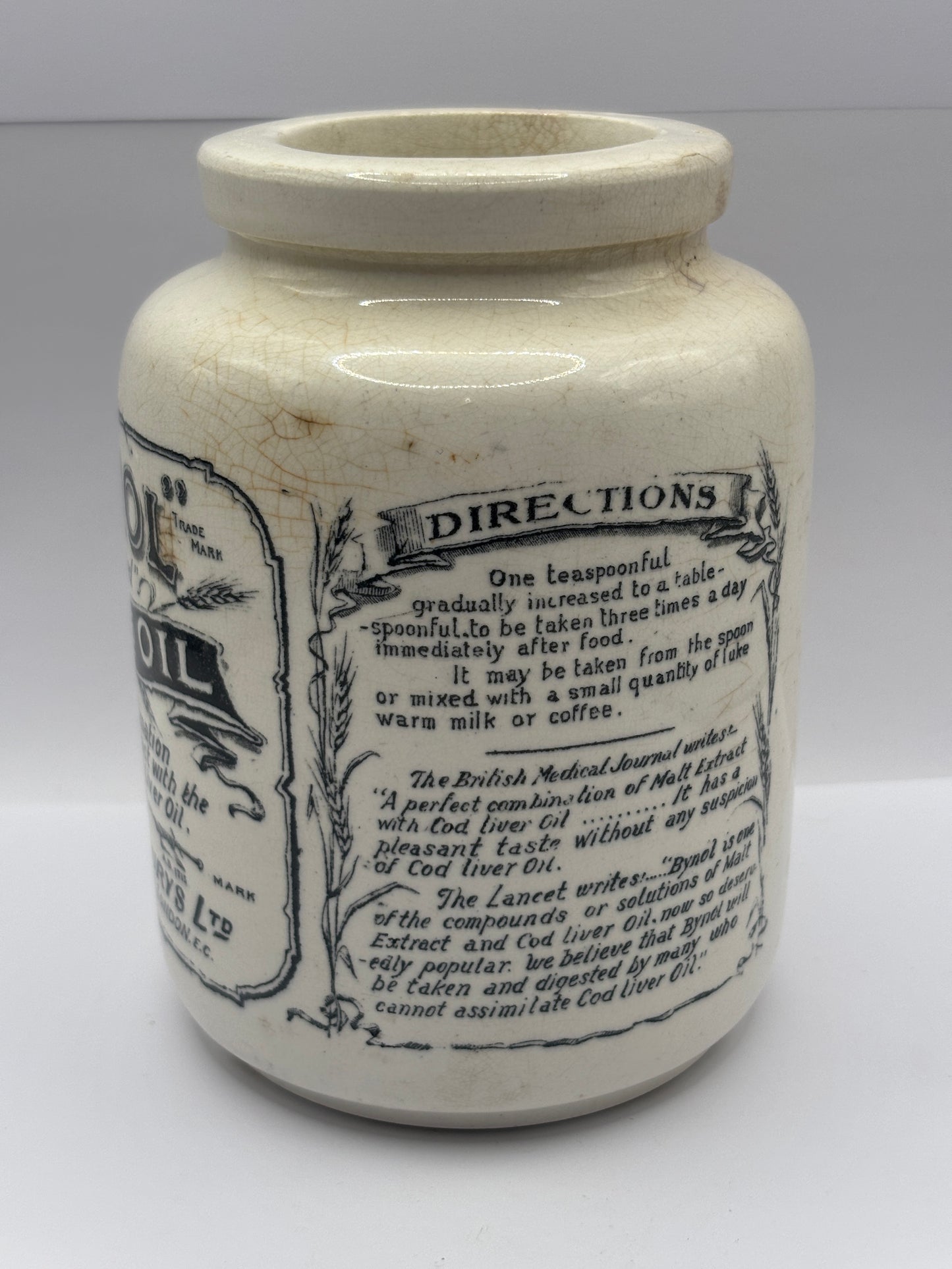Old stoneware advertising jar, Bynol the perfected malt & oil