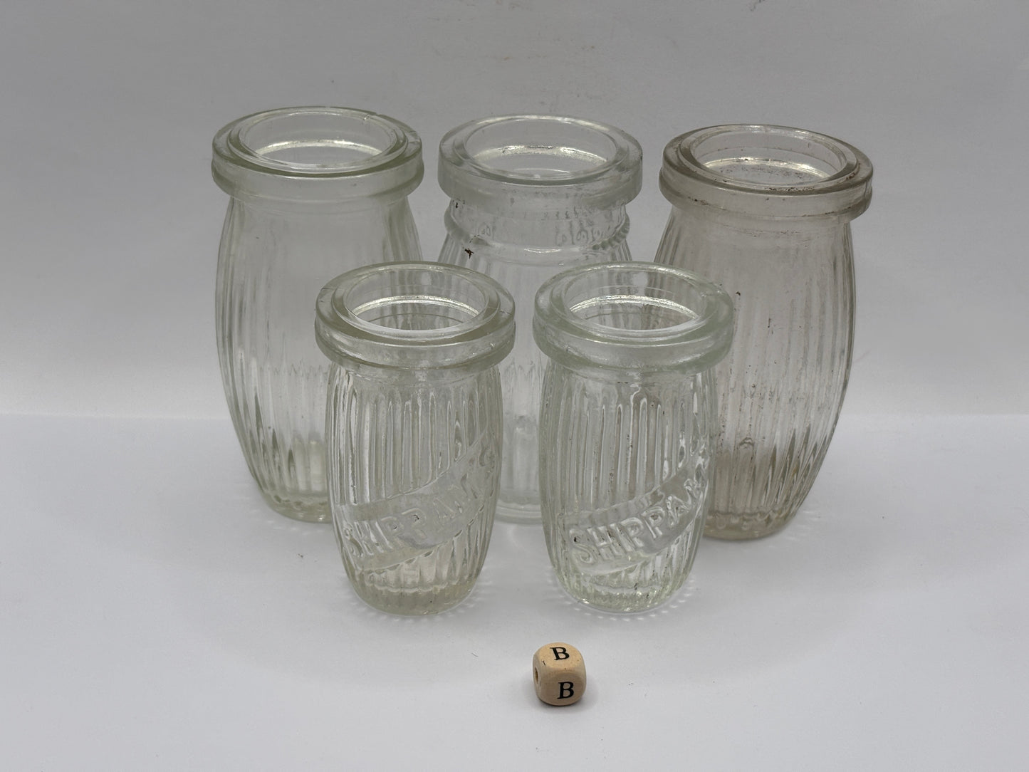 5 old clear glass meat paste jars (B)