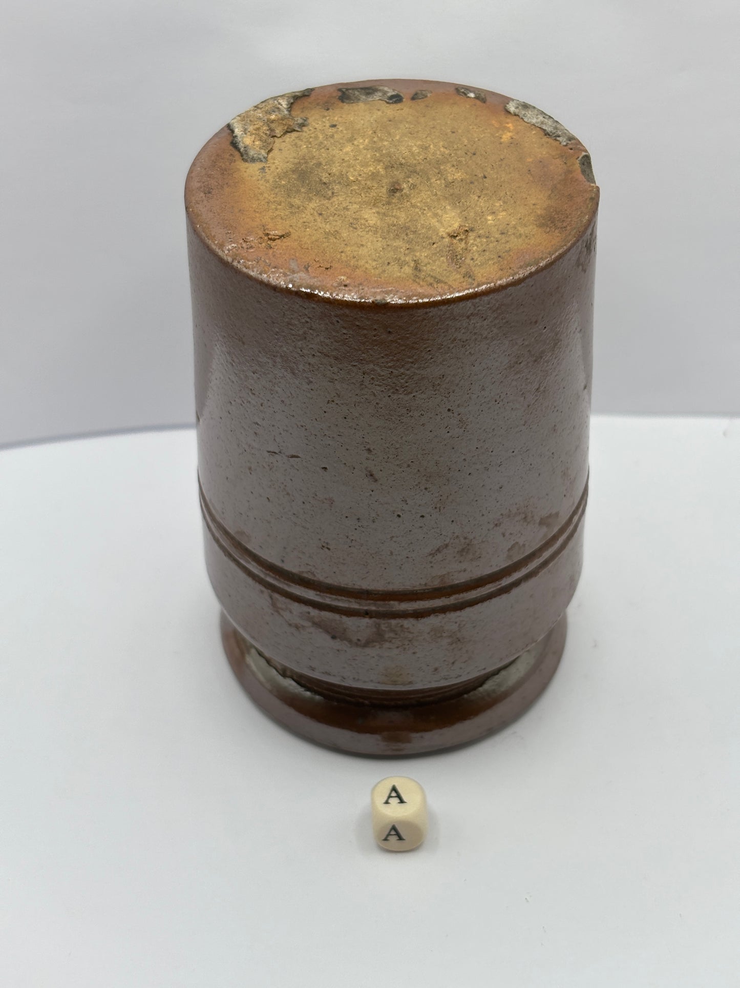 Old brown stoneware jar (a)