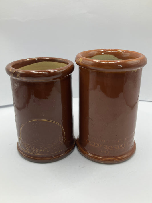 2 brown stoneware cream pots