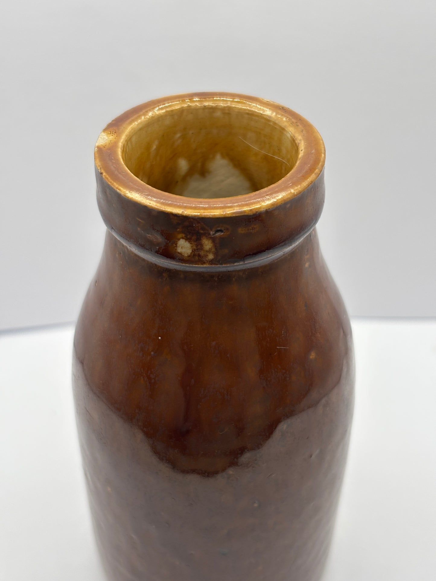 Old brown stoneware jar