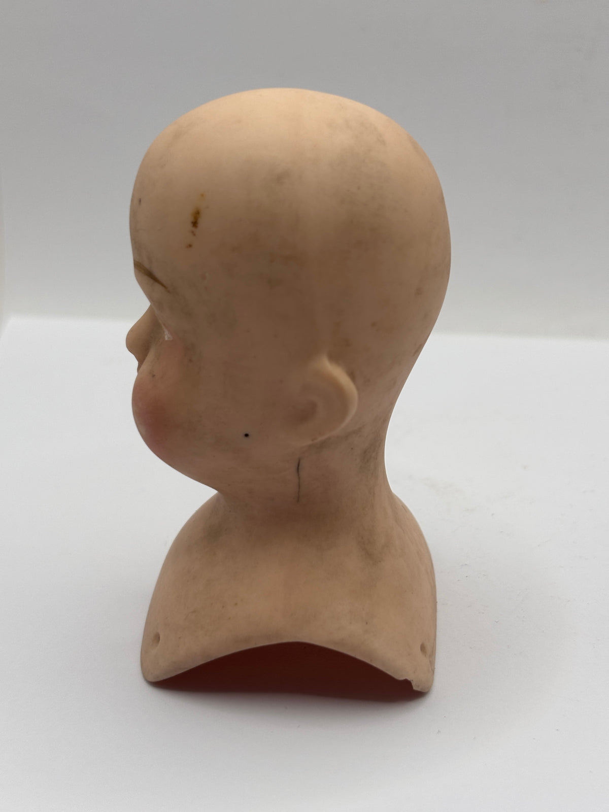 Old dolls head 9cms