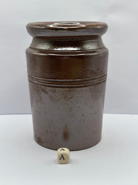 Old brown stoneware jar (a)