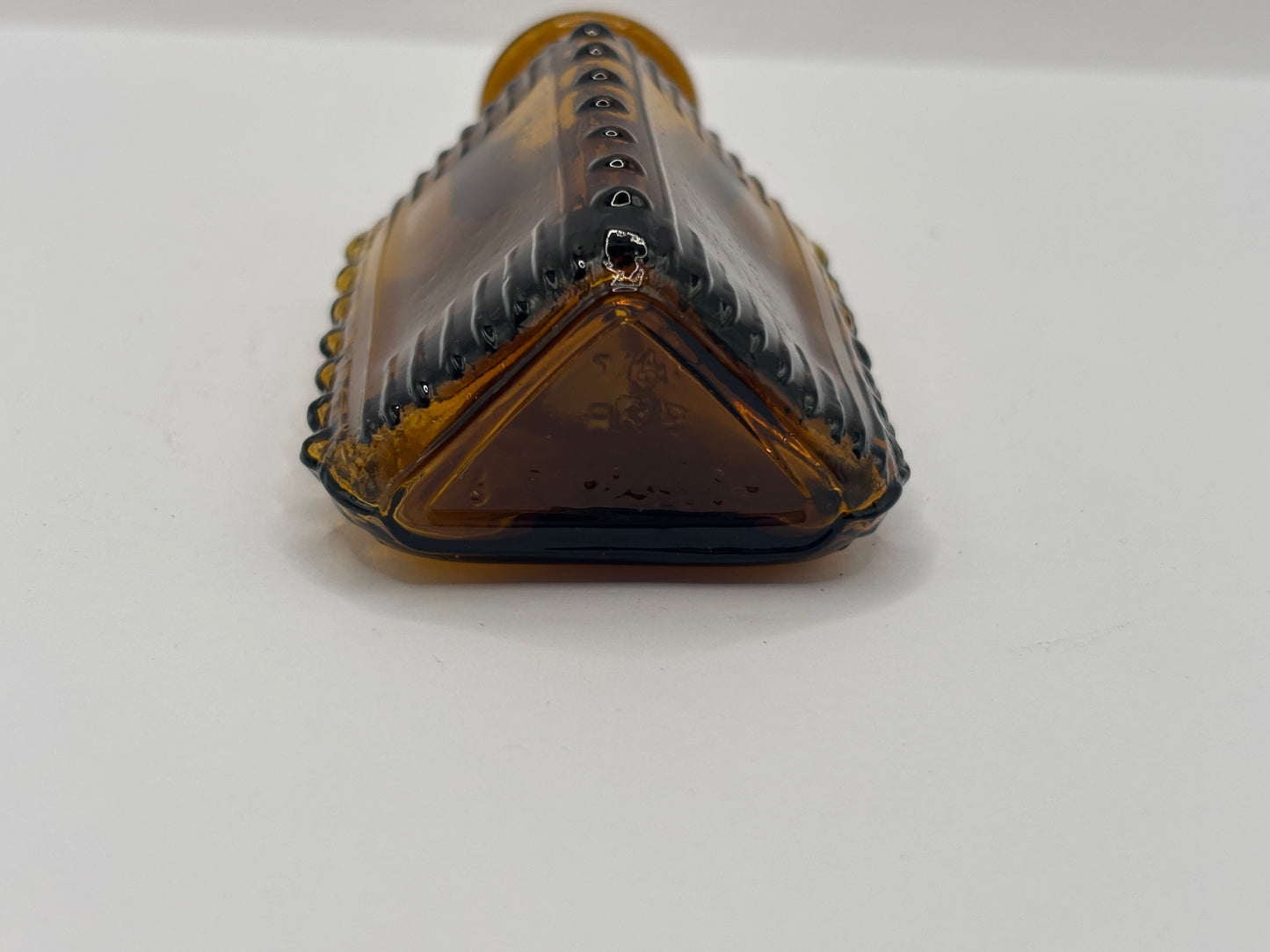 Old amber glass poison bottle