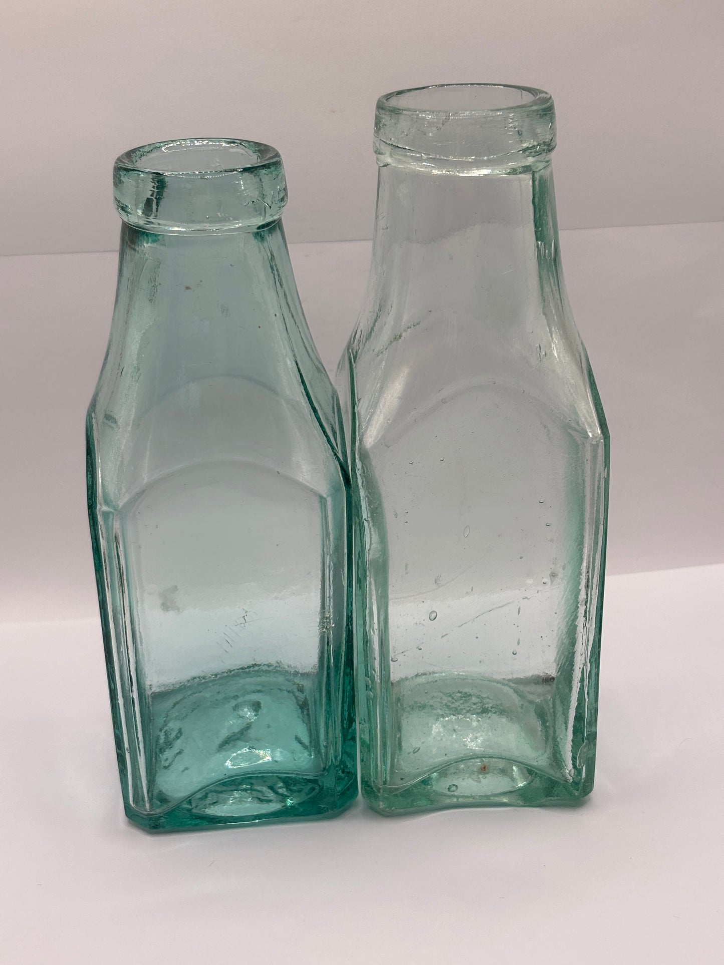 2 Old aqua glass pickle jars