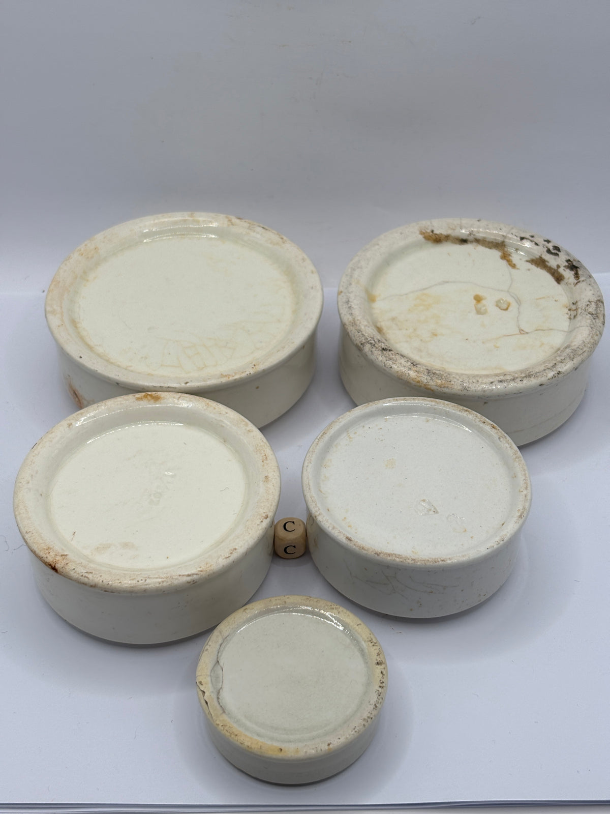5 old stoneware pot lid bases, stackers (c)