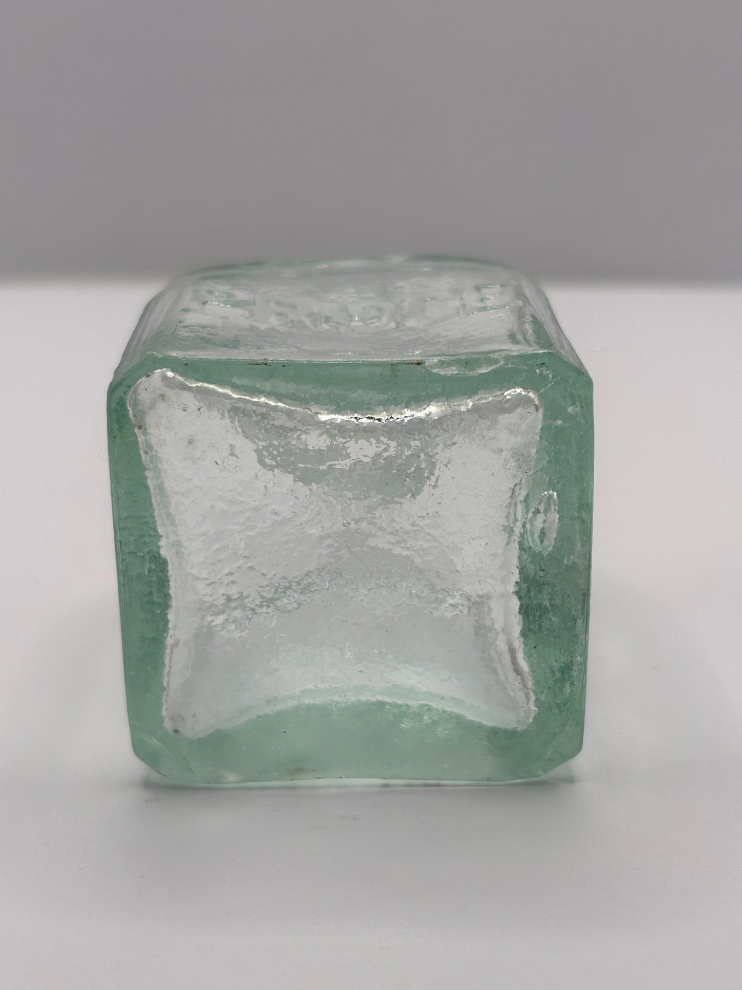 Old aqua glass advertising inkwell, ink bottle. Pridge