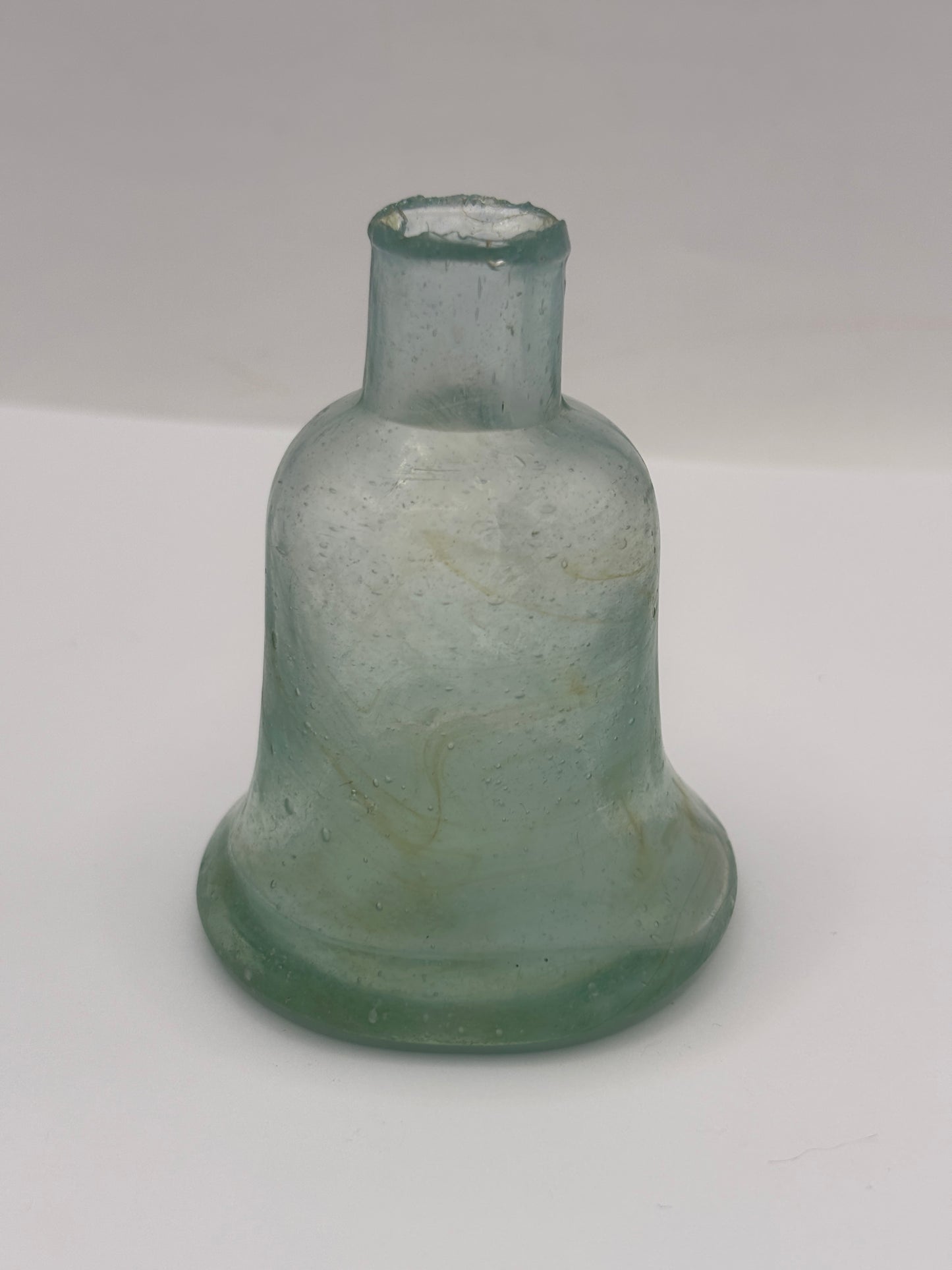 Old aqua glass inkwell, Bell ink. Swirly 7cms