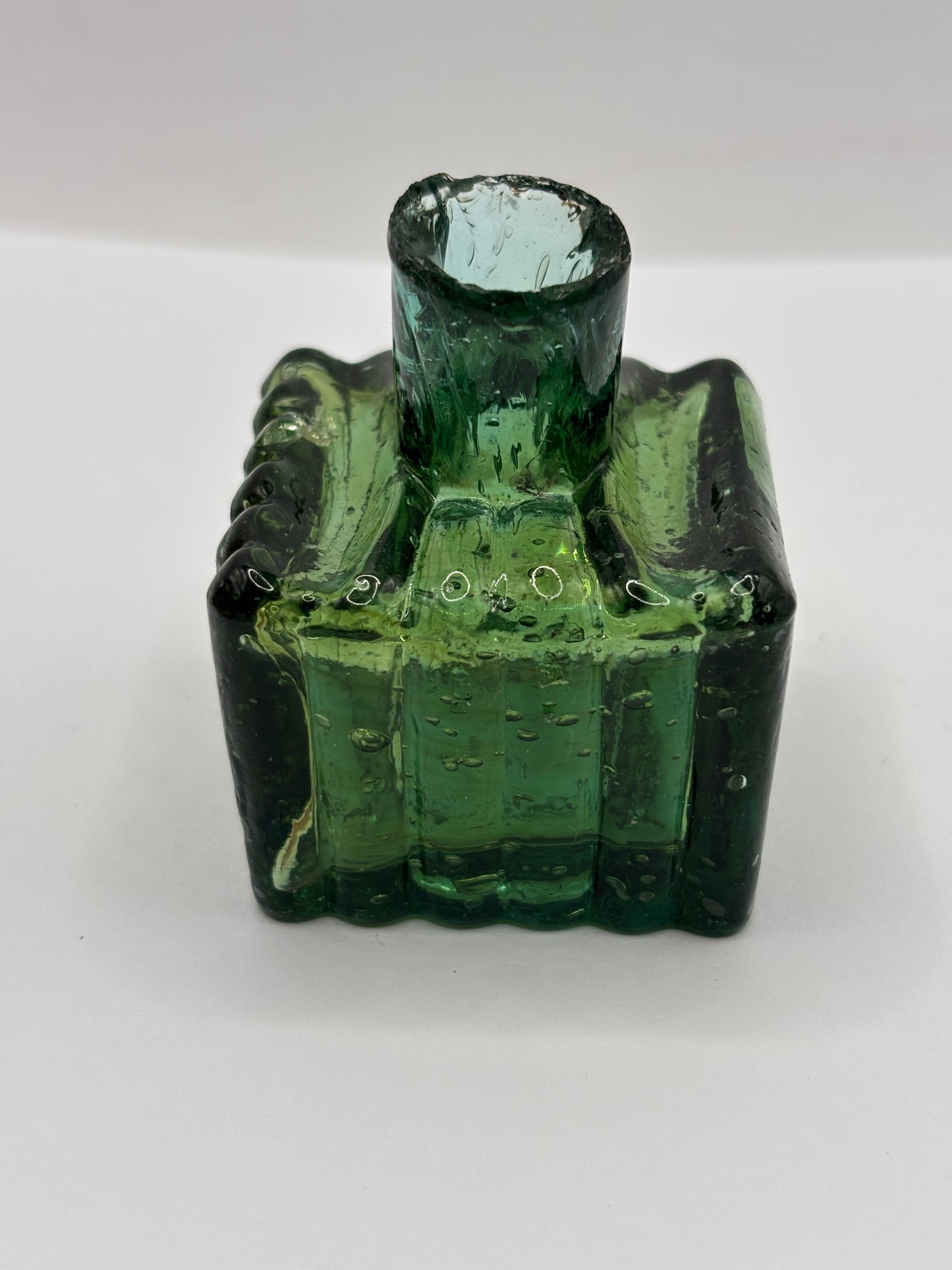 Old green glass ribbed inkwell, ink bottle, penny ink