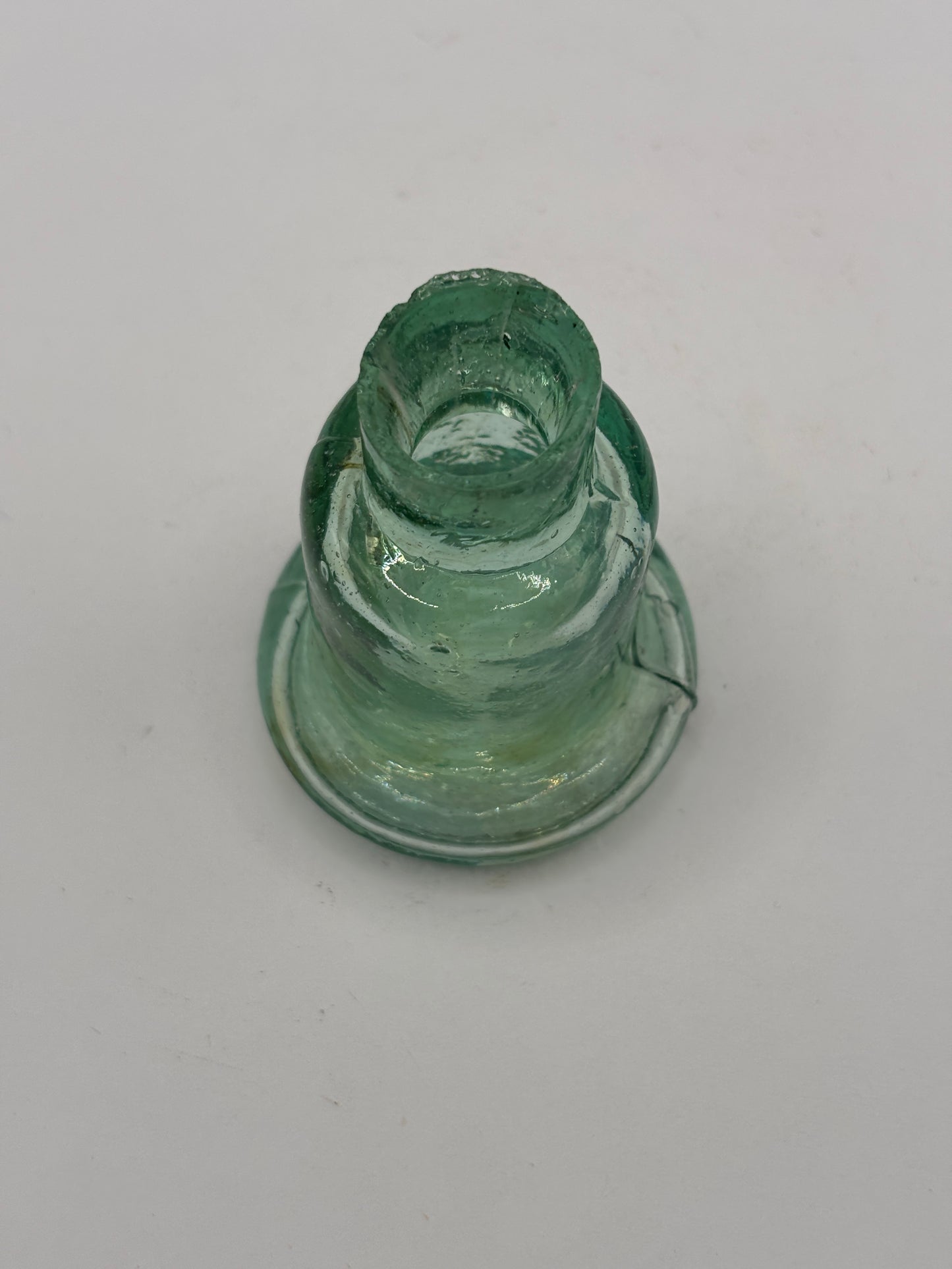 Old aqua glass inkwell, Bell ink. Ink bottle