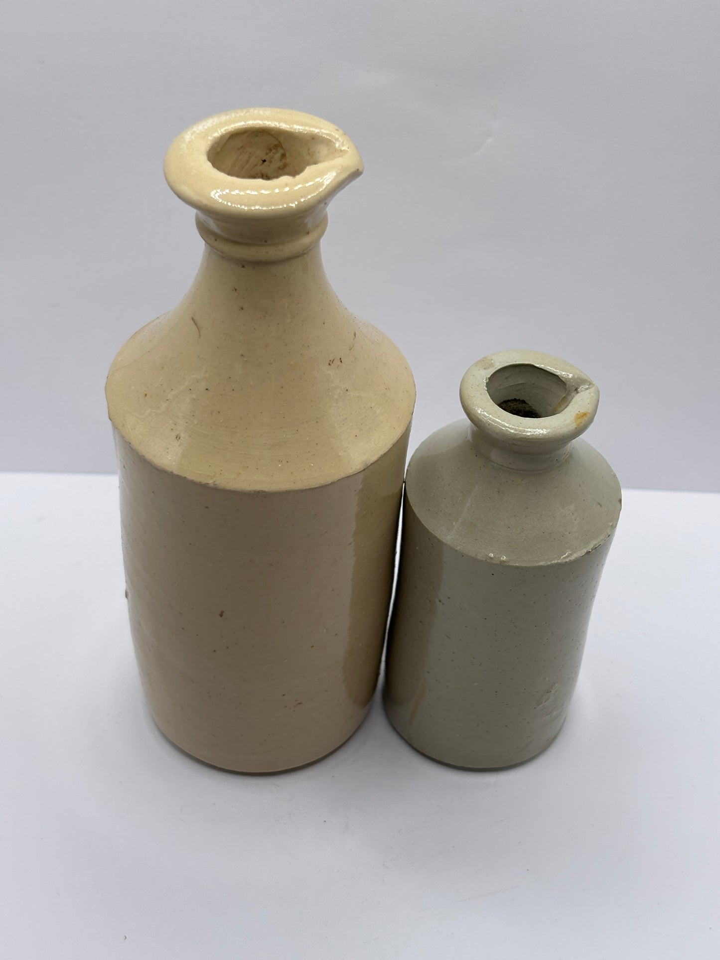 2 old white stoneware pouring ink bottles