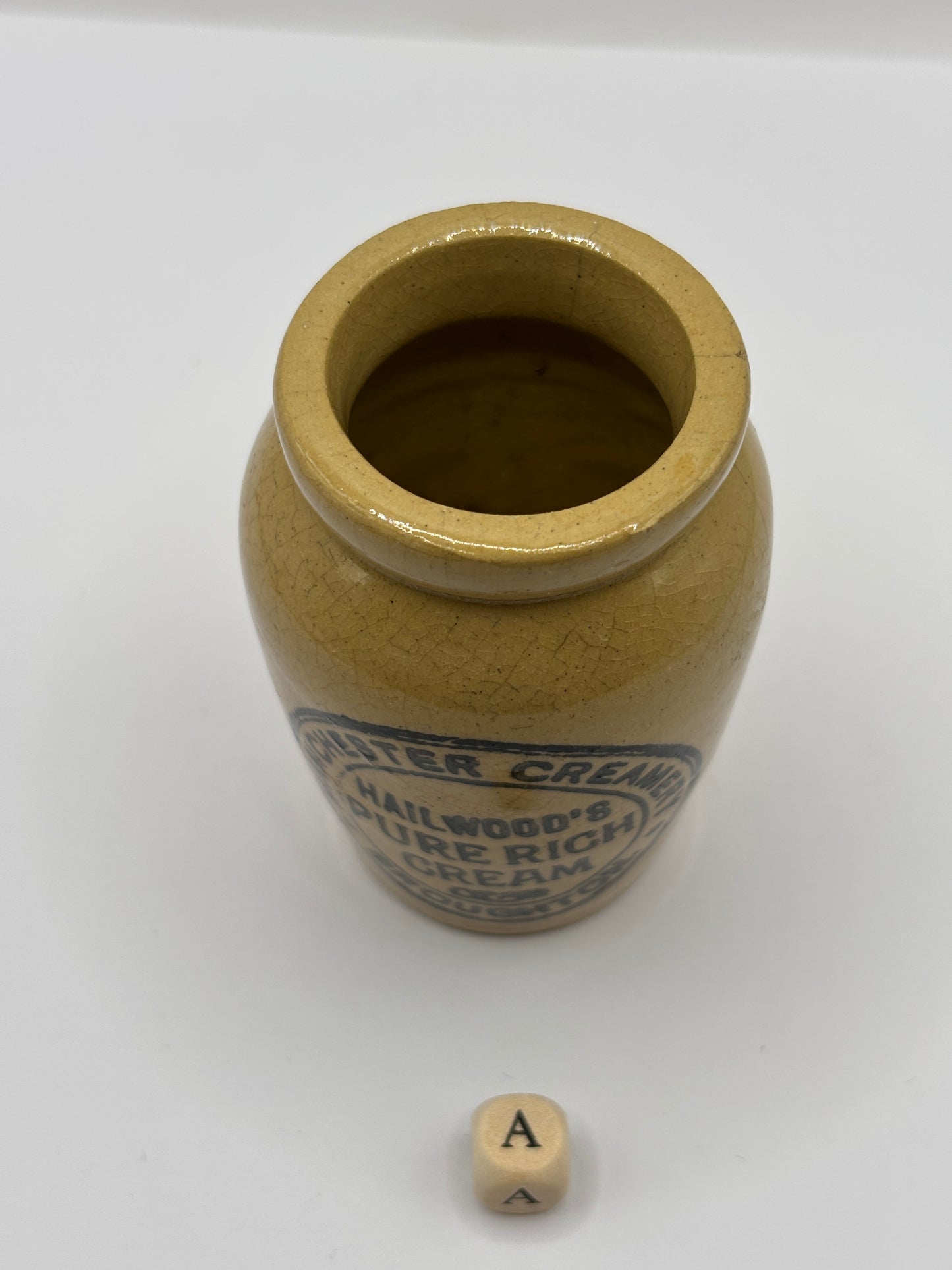 Old advertising cream pot, Manchester creamery Hailwoods cream (a) hairlined