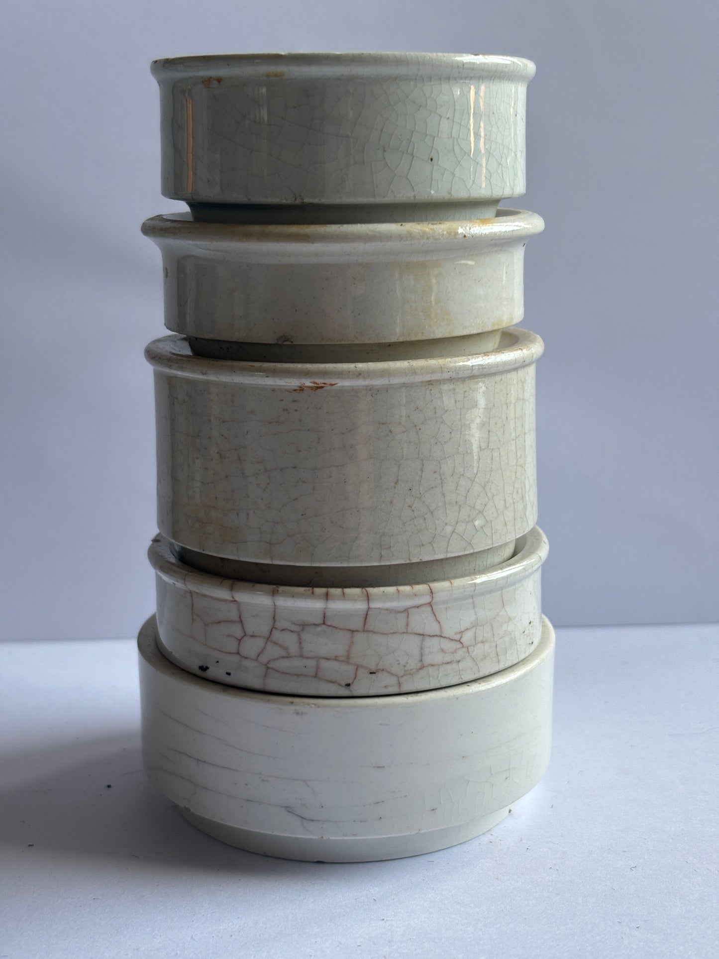 5 old pot lid bases, stackers, risers